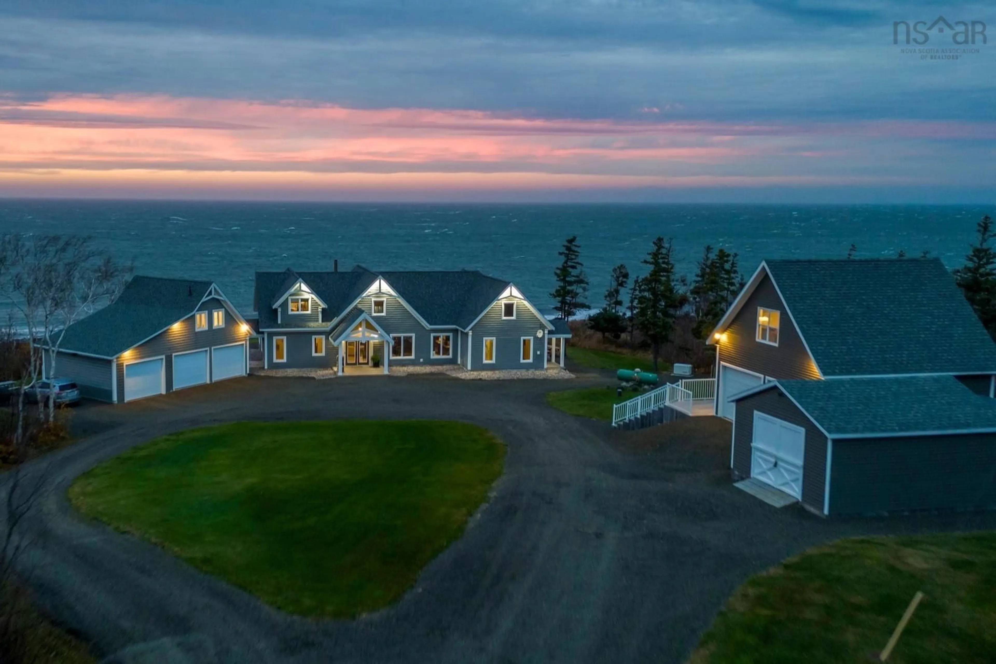 A pic from outside/outdoor area/front of a property/back of a property/a pic from drone, water/lake/river/ocean view for 5199 Shore Rd, Parkers Cove Nova Scotia B0S 1L0