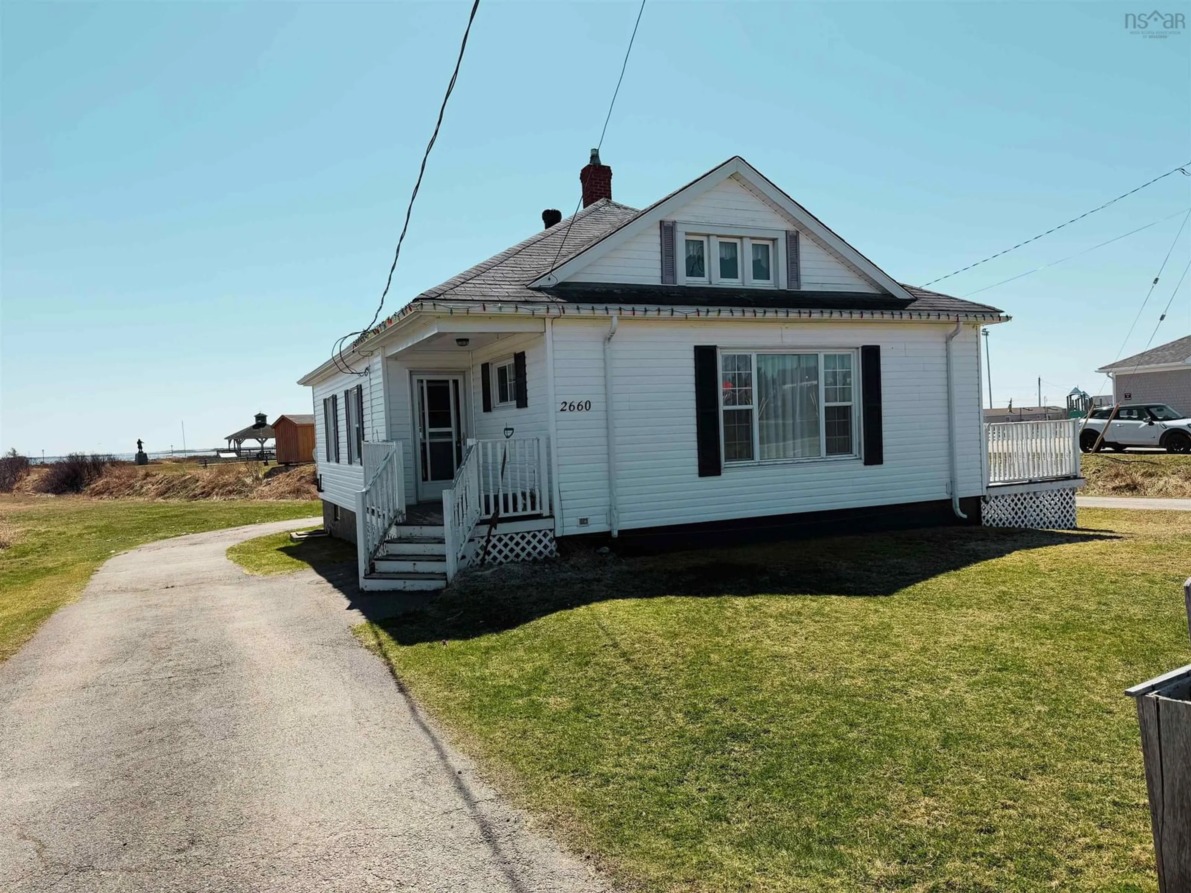 A pic from outside/outdoor area/front of a property/back of a property/a pic from drone, street for 2660 Main St, Clark's Harbour Nova Scotia B0W 1P0