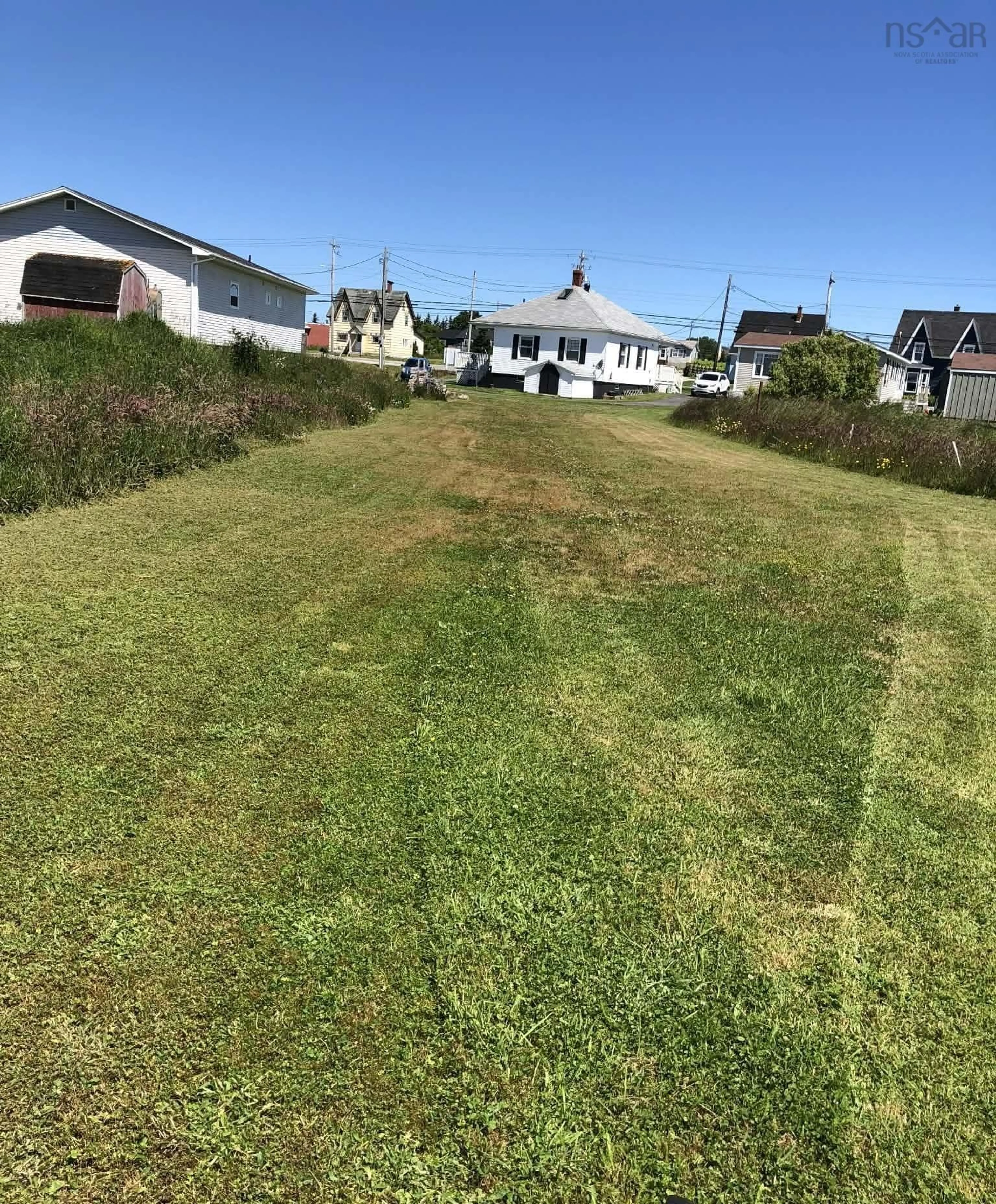 A pic from outside/outdoor area/front of a property/back of a property/a pic from drone, street for 2660 Main St, Clark's Harbour Nova Scotia B0W 1P0