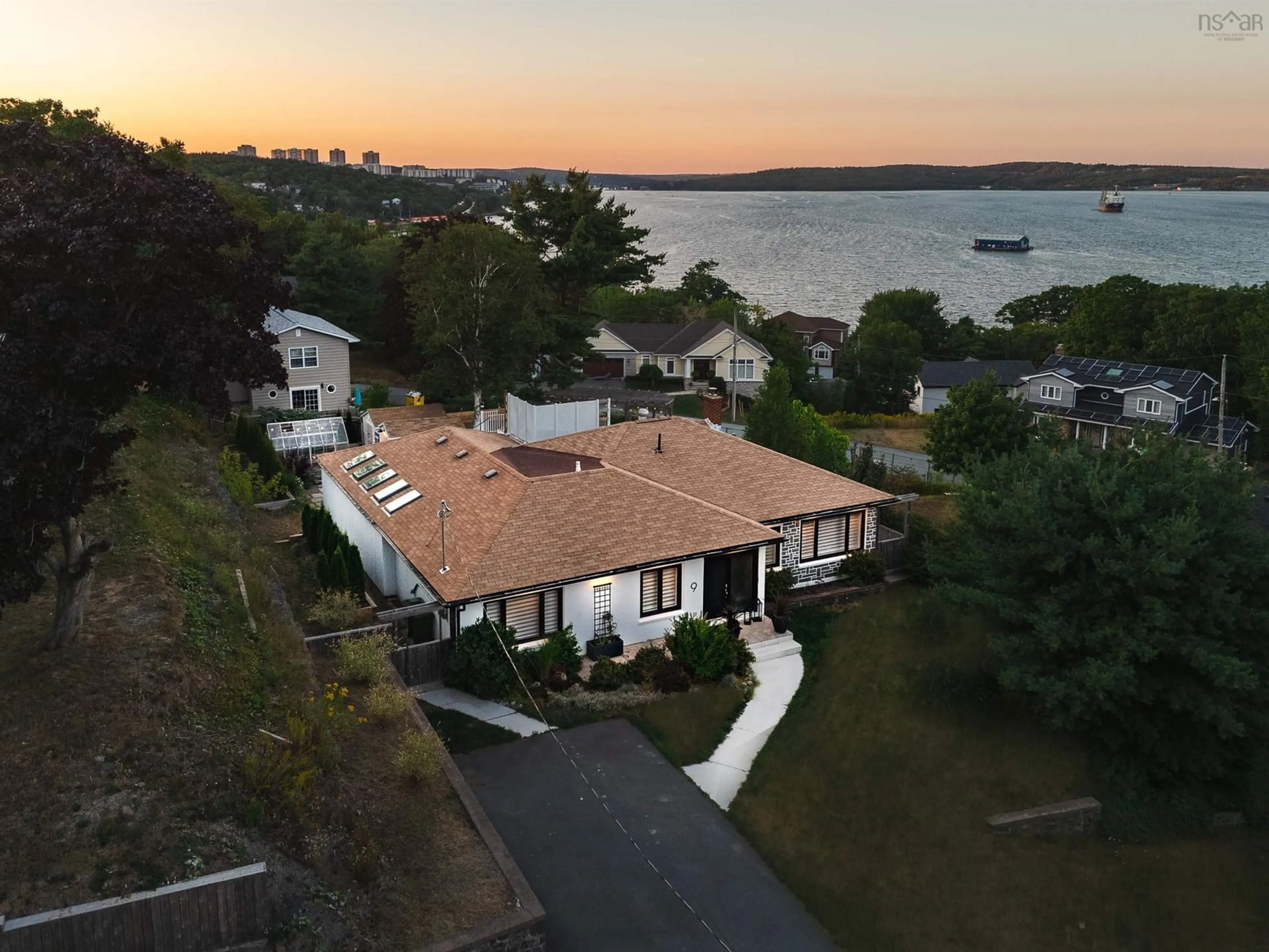 A pic from outside/outdoor area/front of a property/back of a property/a pic from drone, water/lake/river/ocean view for 9 Lynwood Dr, Halifax Nova Scotia B3M 1Y8