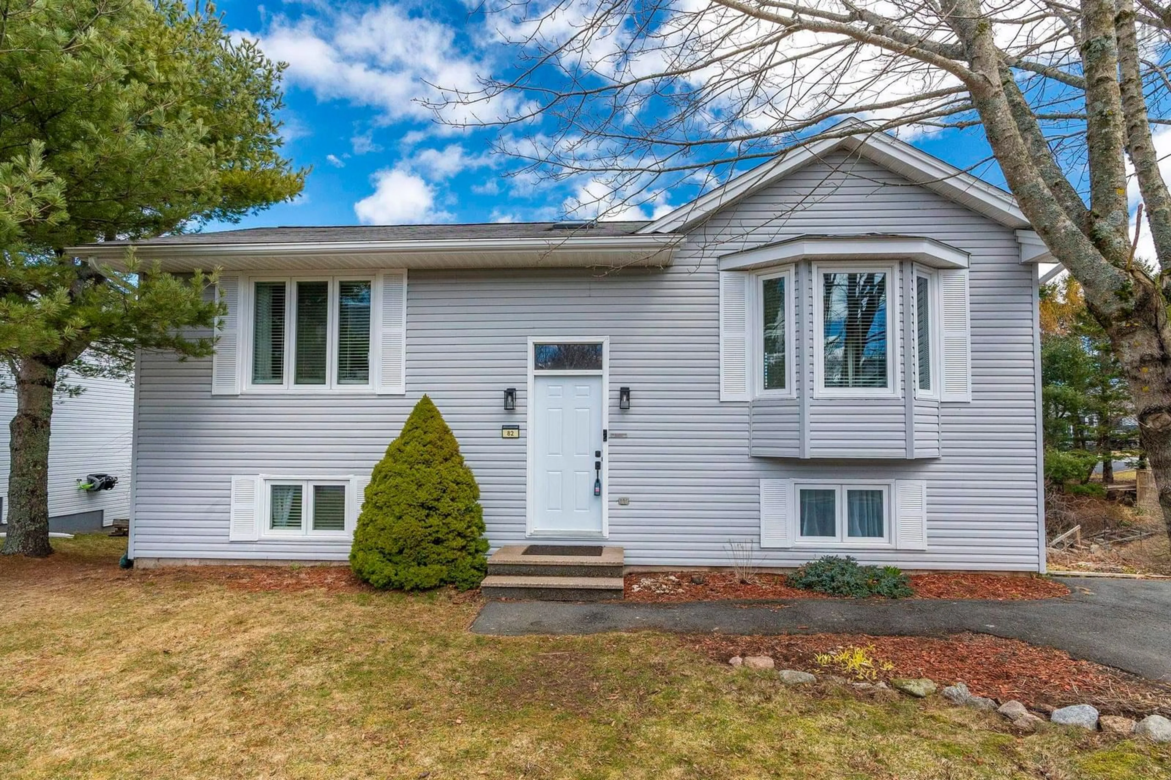 Home with vinyl exterior material, street for 82 Governors Lake Dr, Timberlea Nova Scotia B3T 1A5