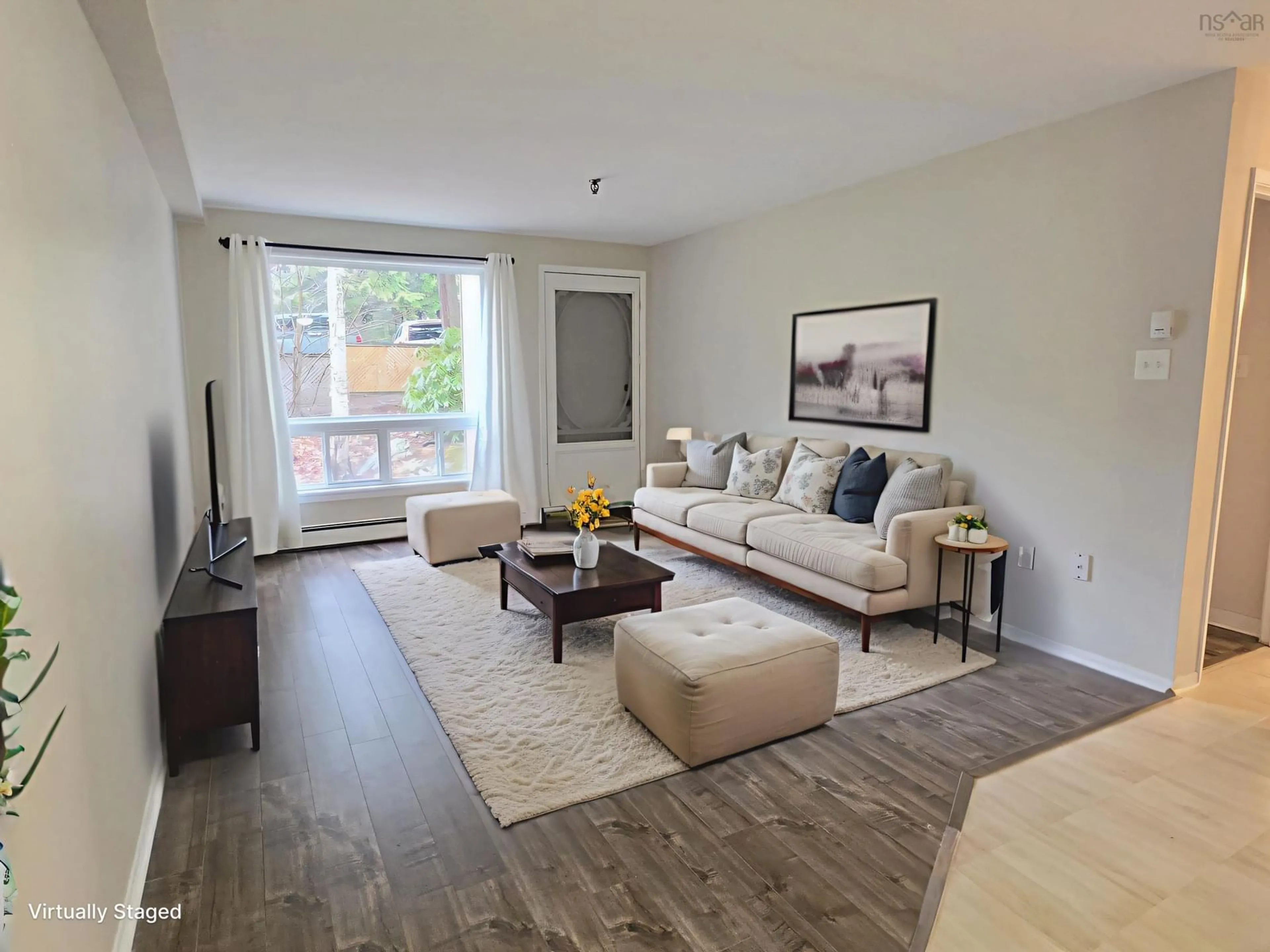 Living room with furniture, wood/laminate floor for 41 Moirs Mill Rd #208, Bedford Nova Scotia B4A 3C4