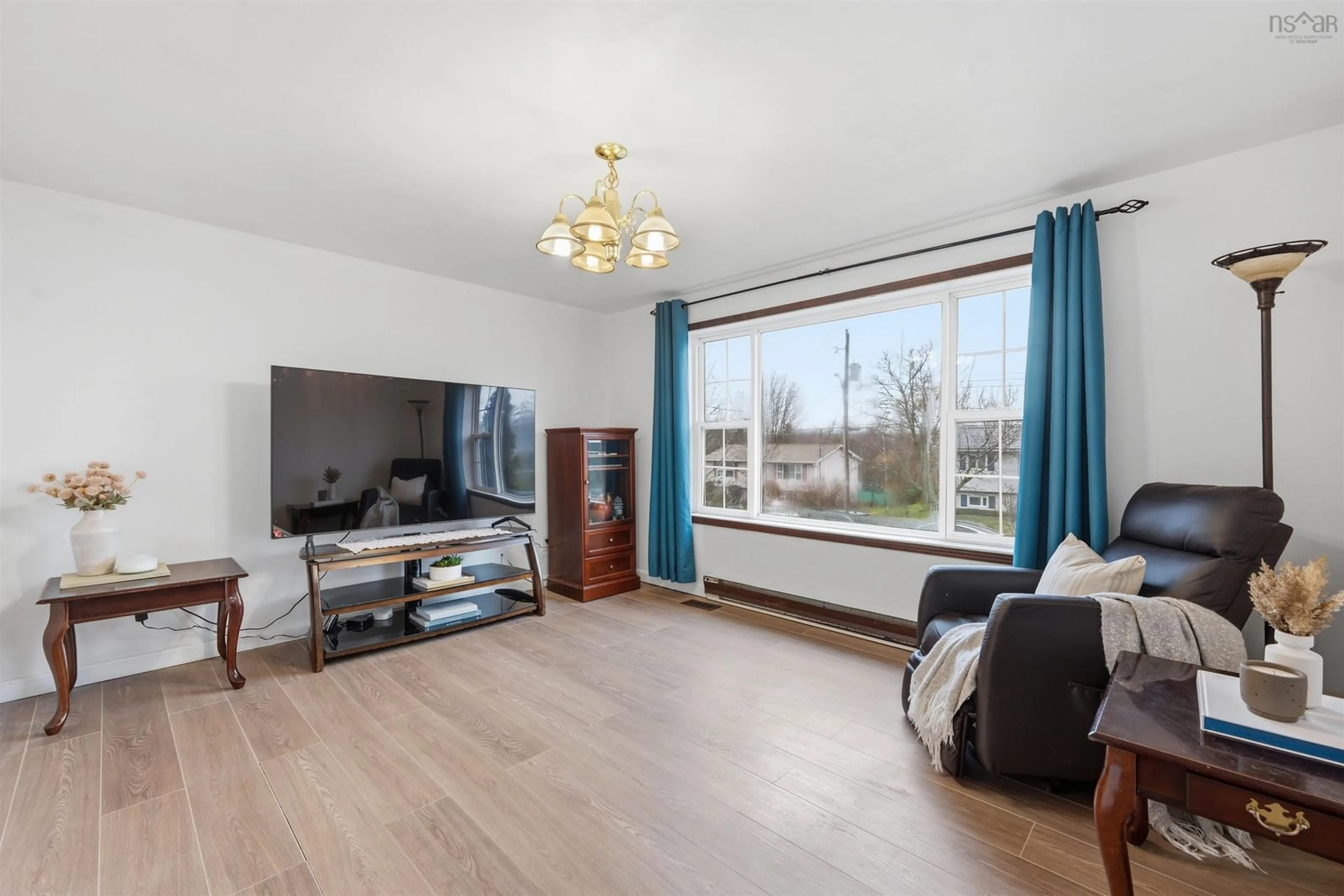 Living room with furniture, wood/laminate floor for 6 Granby Crt, Halifax Nova Scotia B3R 2M7