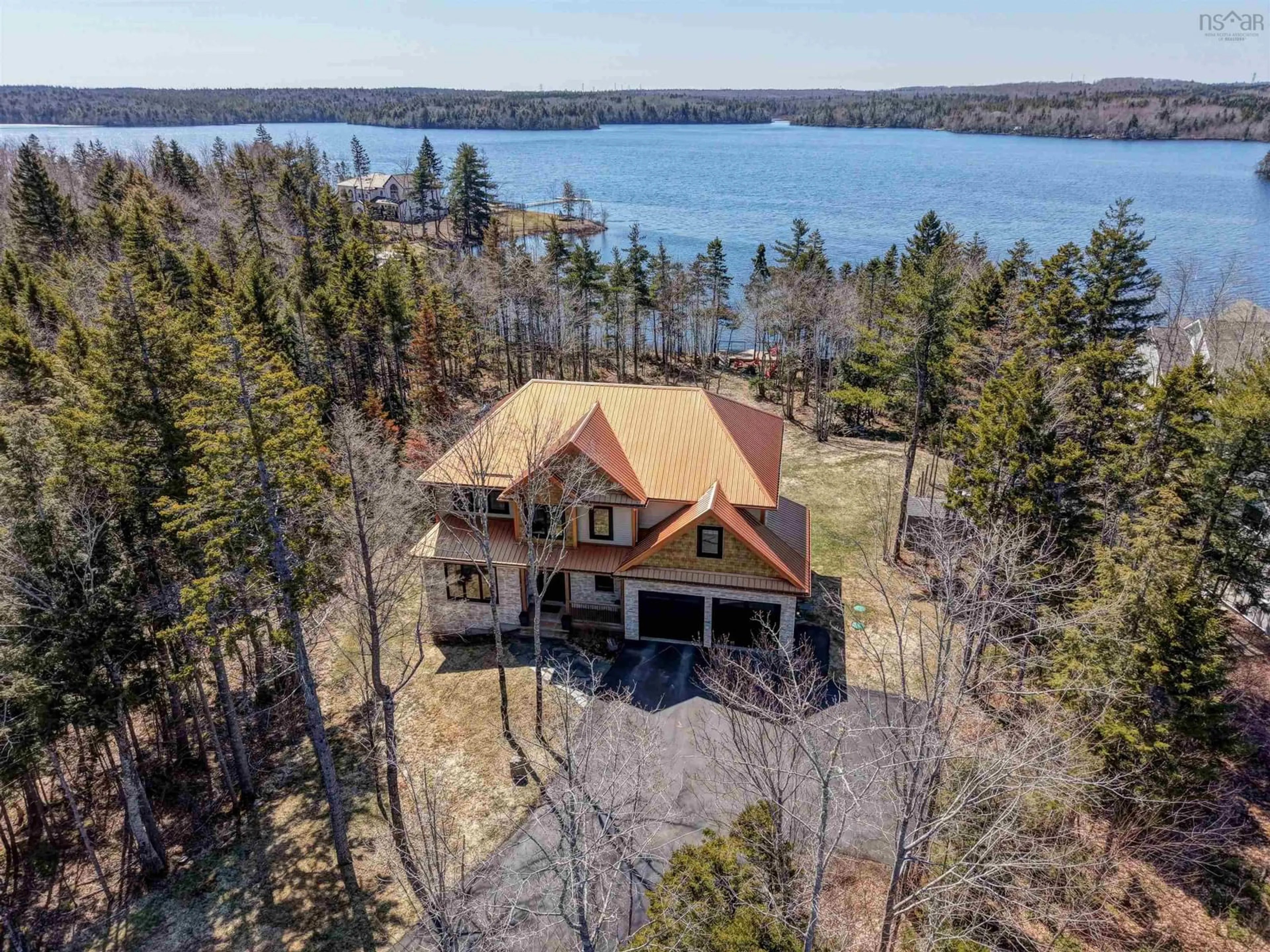 A pic from outside/outdoor area/front of a property/back of a property/a pic from drone, water/lake/river/ocean view for 460 Mccabe Lake Dr, Middle Sackville Nova Scotia B4E 0N6