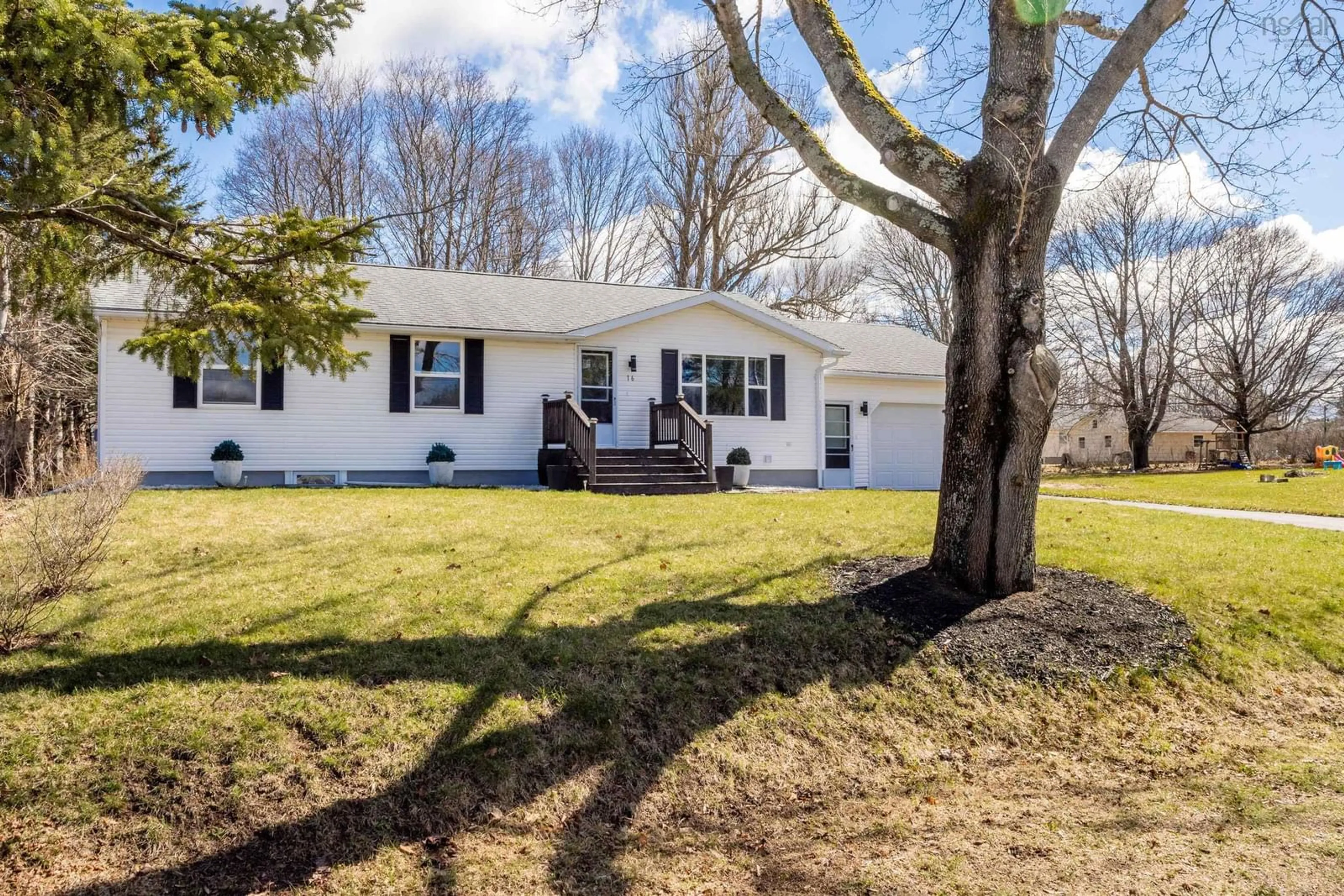 Home with vinyl exterior material, street for 16 Hillcrest Ave, Nictaux Nova Scotia B0S 1P0