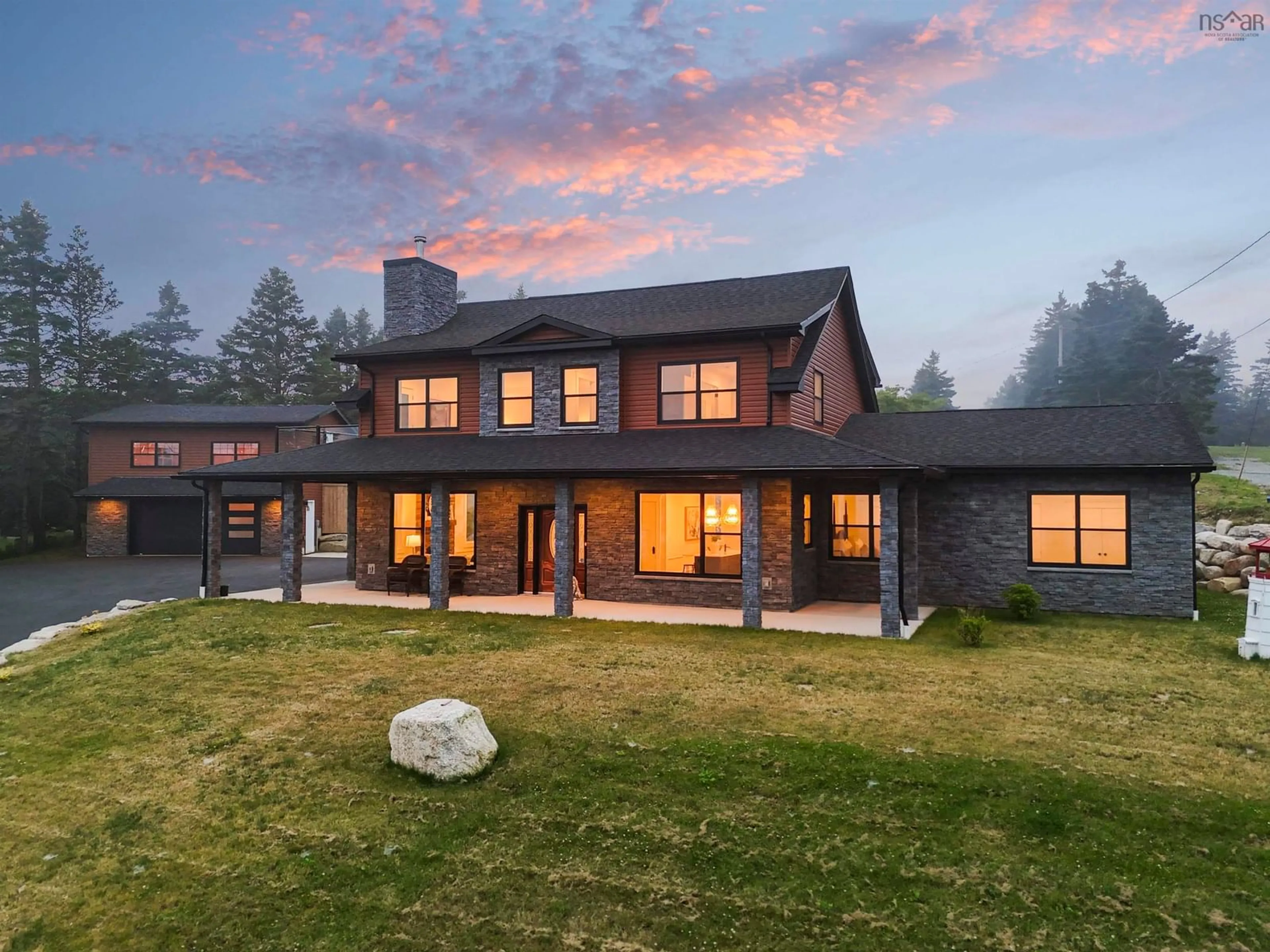 Home with brick exterior material, mountain view for 657 Ketch Harbour Rd, Portuguese Cove Nova Scotia B3V 1K1