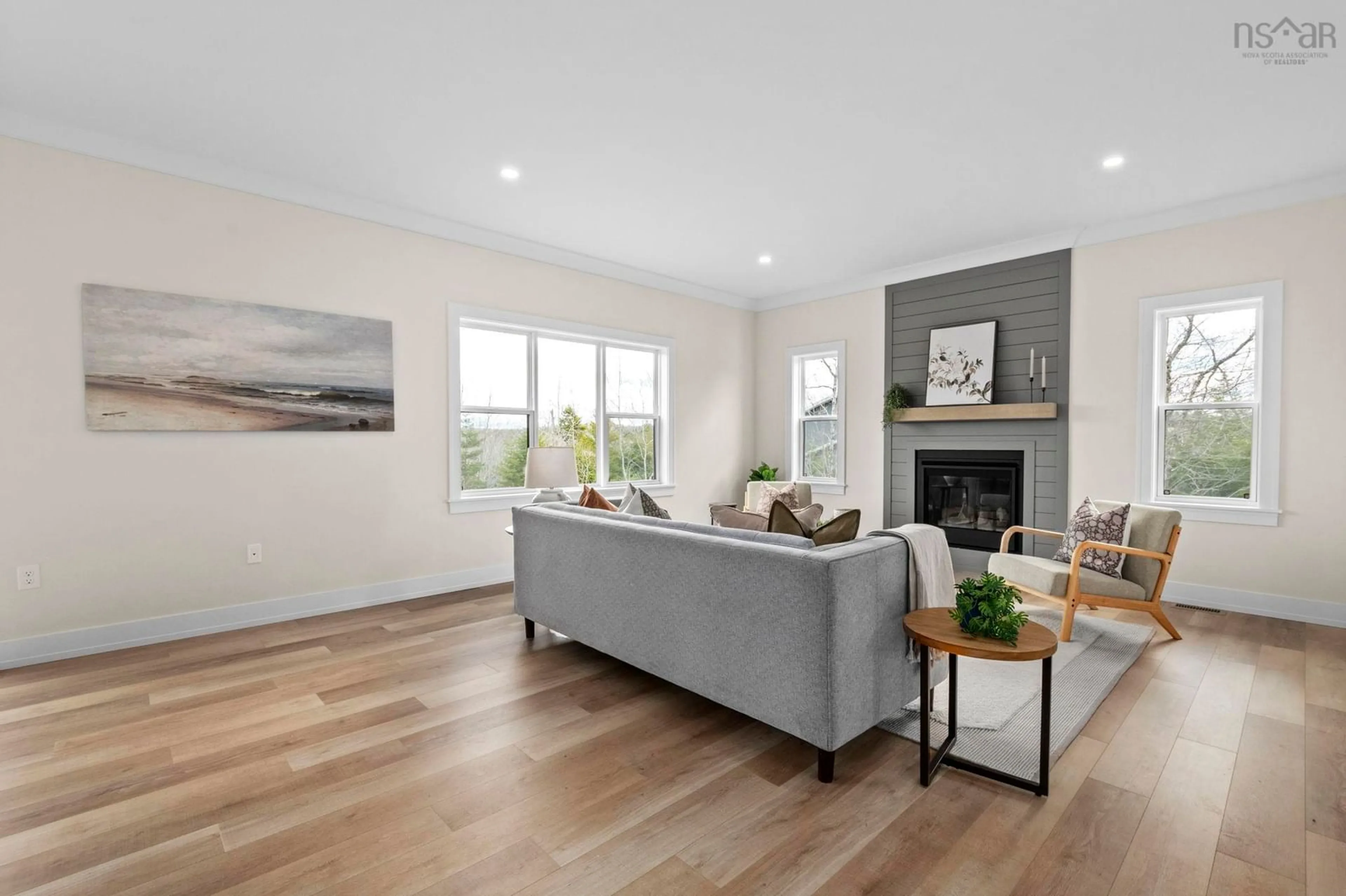 Living room with furniture, wood/laminate floor for 209 Orchid Court, Middle Sackville Nova Scotia B4E 0X2
