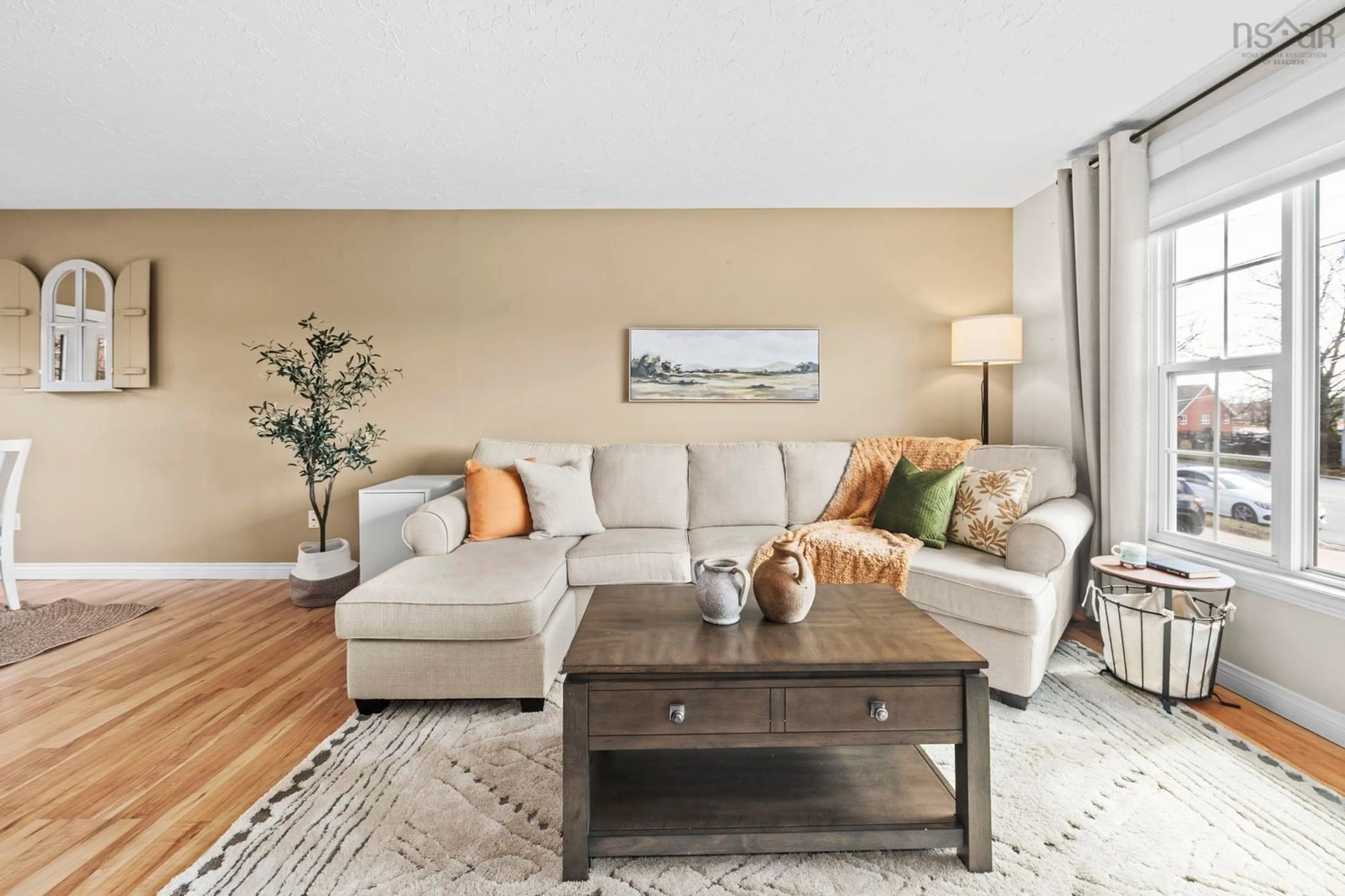 Living room with furniture, wood/laminate floor for 43 Woodlawn Rd, Dartmouth Nova Scotia B2W 2R7