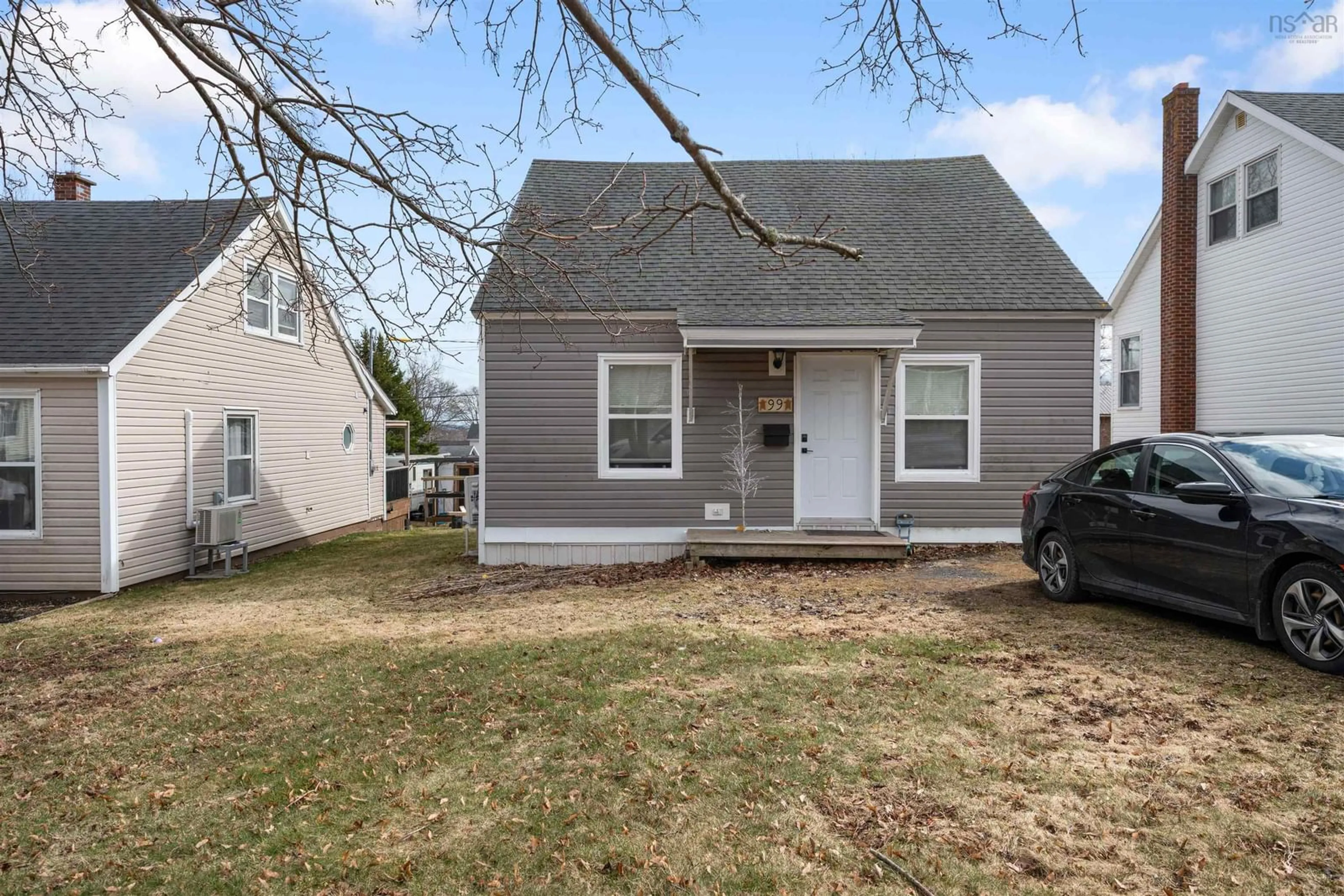 Home with vinyl exterior material, street for 99 Poplar St, Pictou Nova Scotia B0K 1H0