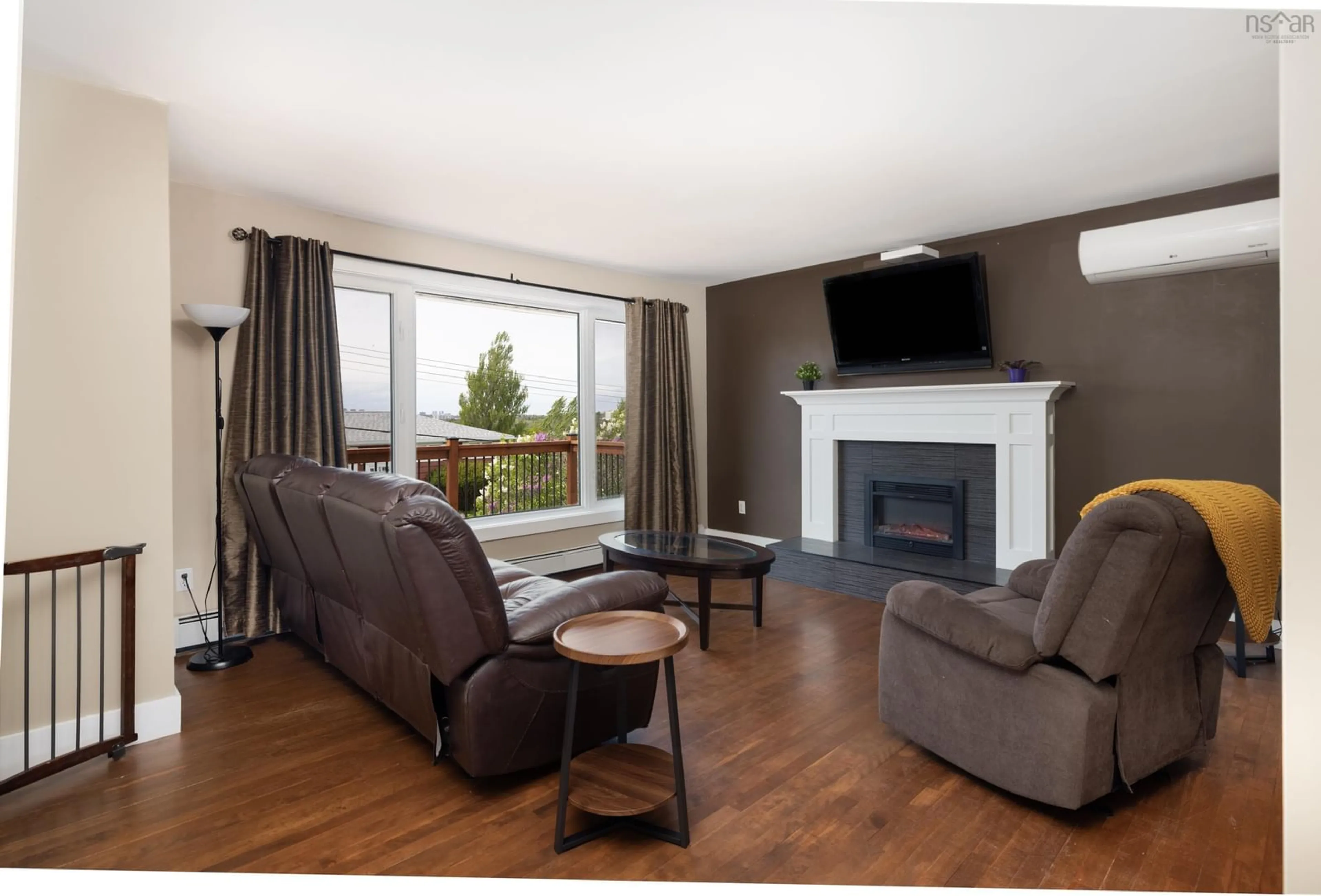 Living room with furniture, wood/laminate floor for 57 Clearview St, Halifax Nova Scotia B3R 1N7