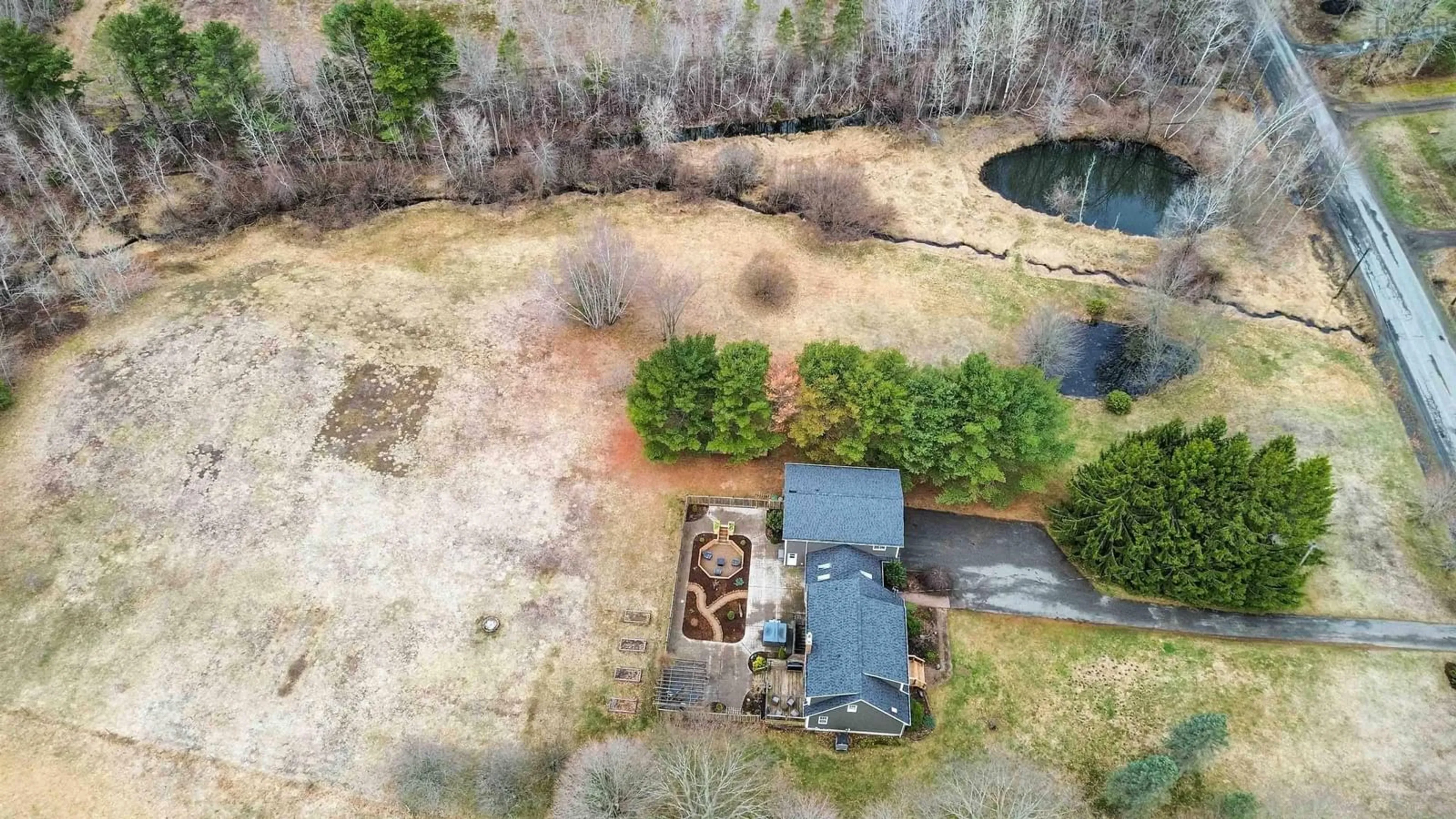 A pic from outside/outdoor area/front of a property/back of a property/a pic from drone, water/lake/river/ocean view for 690 Maple St, East Berwick Nova Scotia B0P 1E0