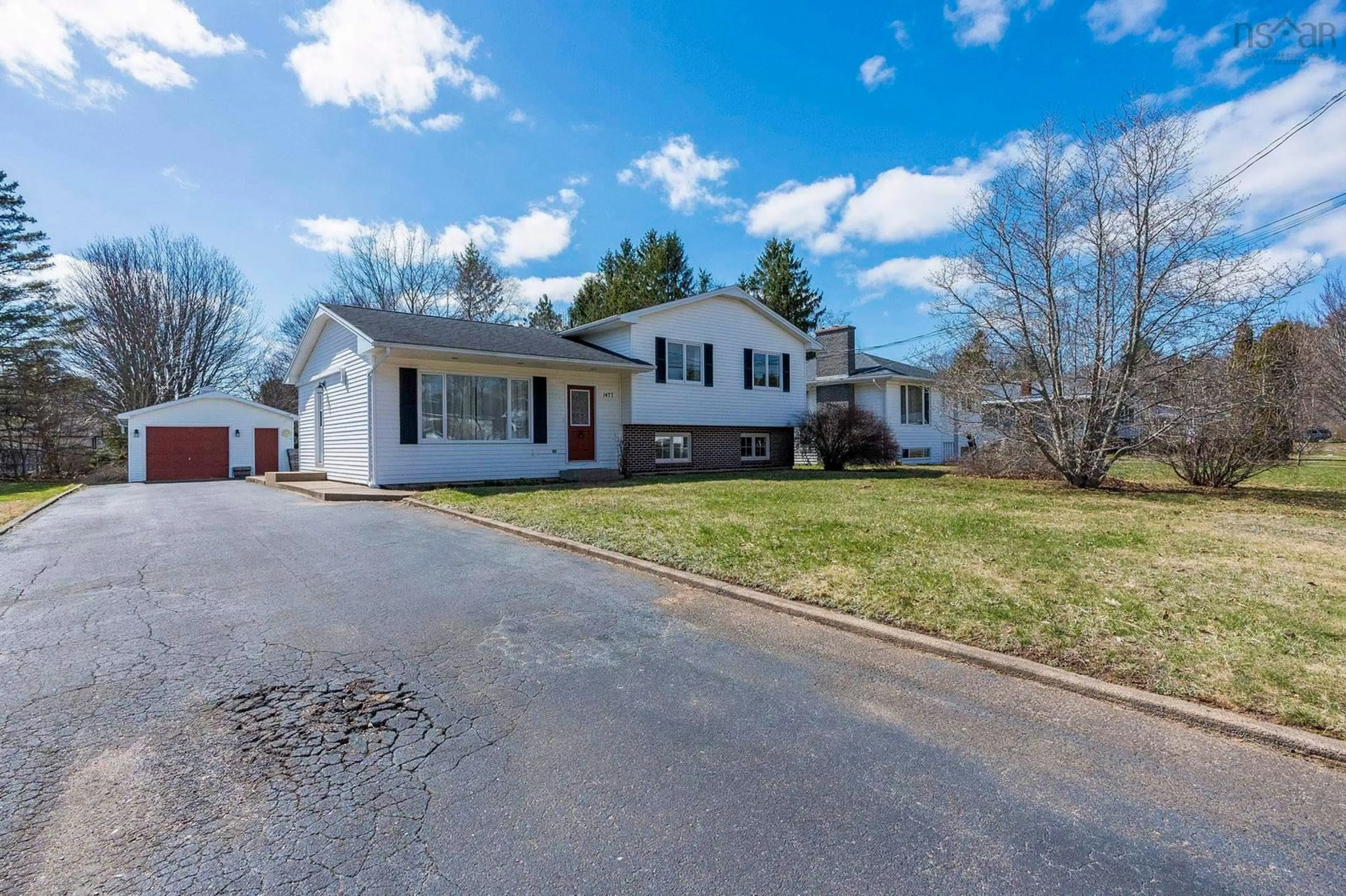 Home with vinyl exterior material, street for 1477 Palmer Drive, Kingston Nova Scotia B0P 1R0