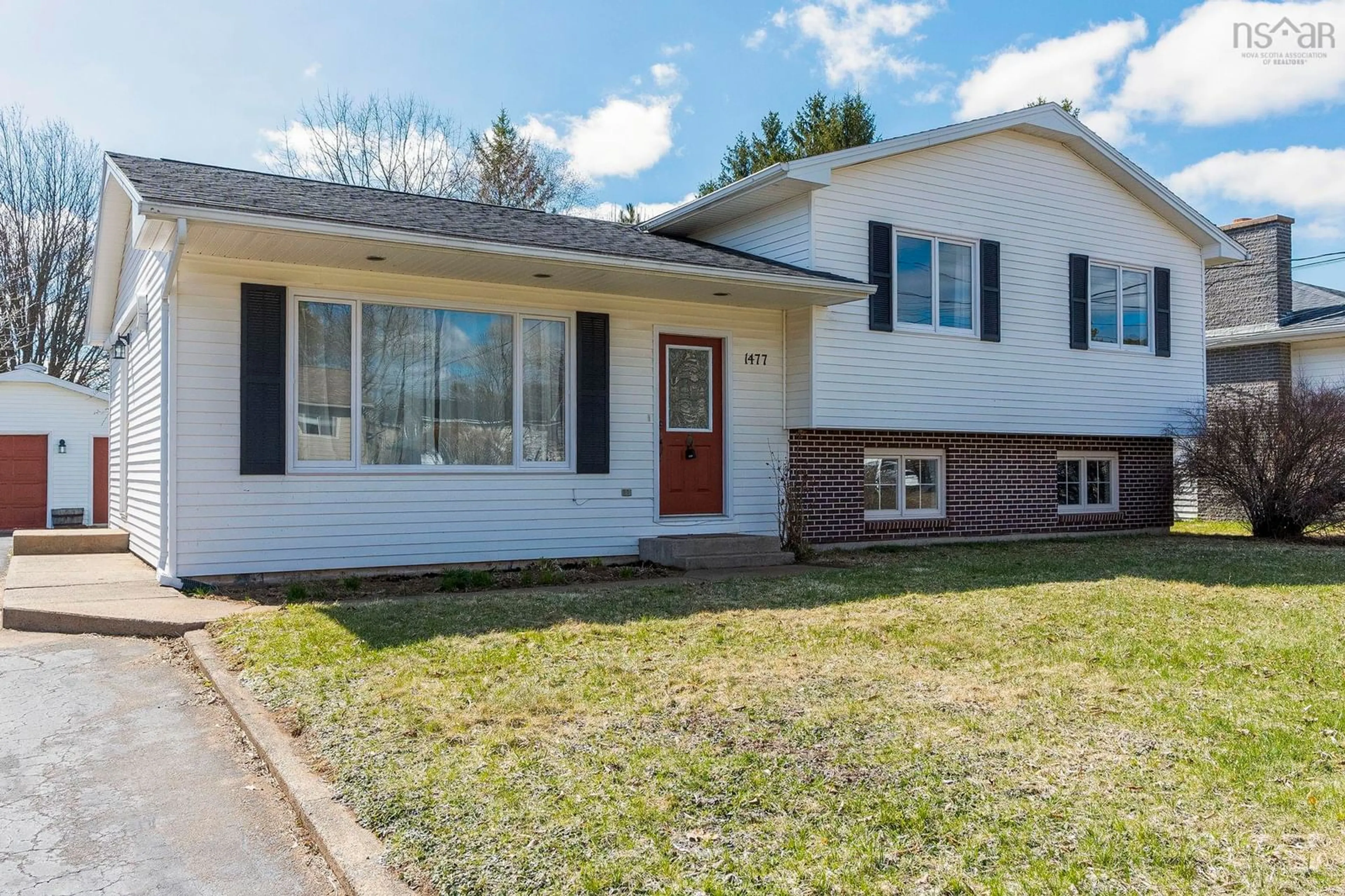 Home with vinyl exterior material, street for 1477 Palmer Drive, Kingston Nova Scotia B0P 1R0
