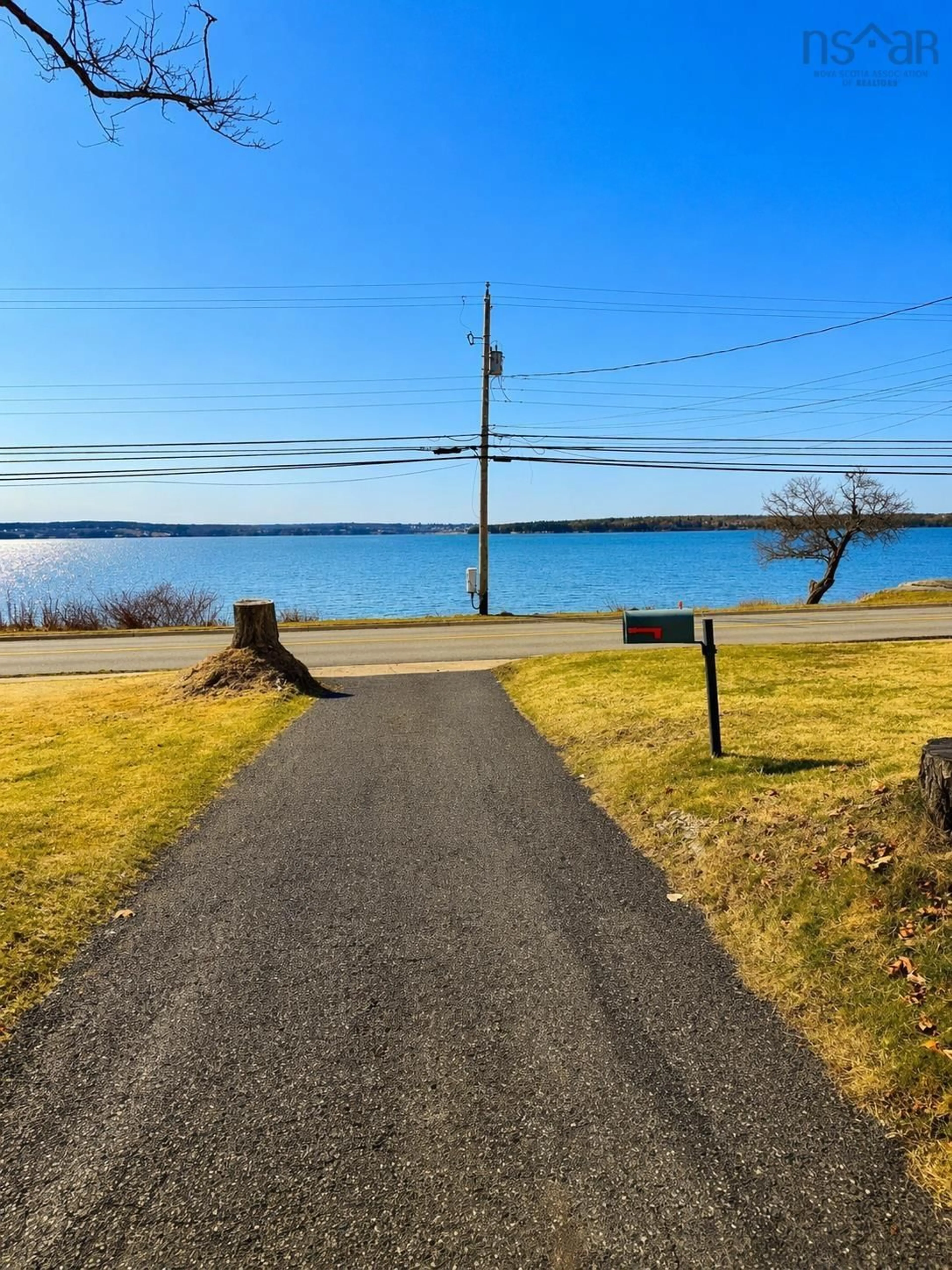 A pic from outside/outdoor area/front of a property/back of a property/a pic from drone, water/lake/river/ocean view for 92 Queen St, North Sydney Nova Scotia B2A 1A6
