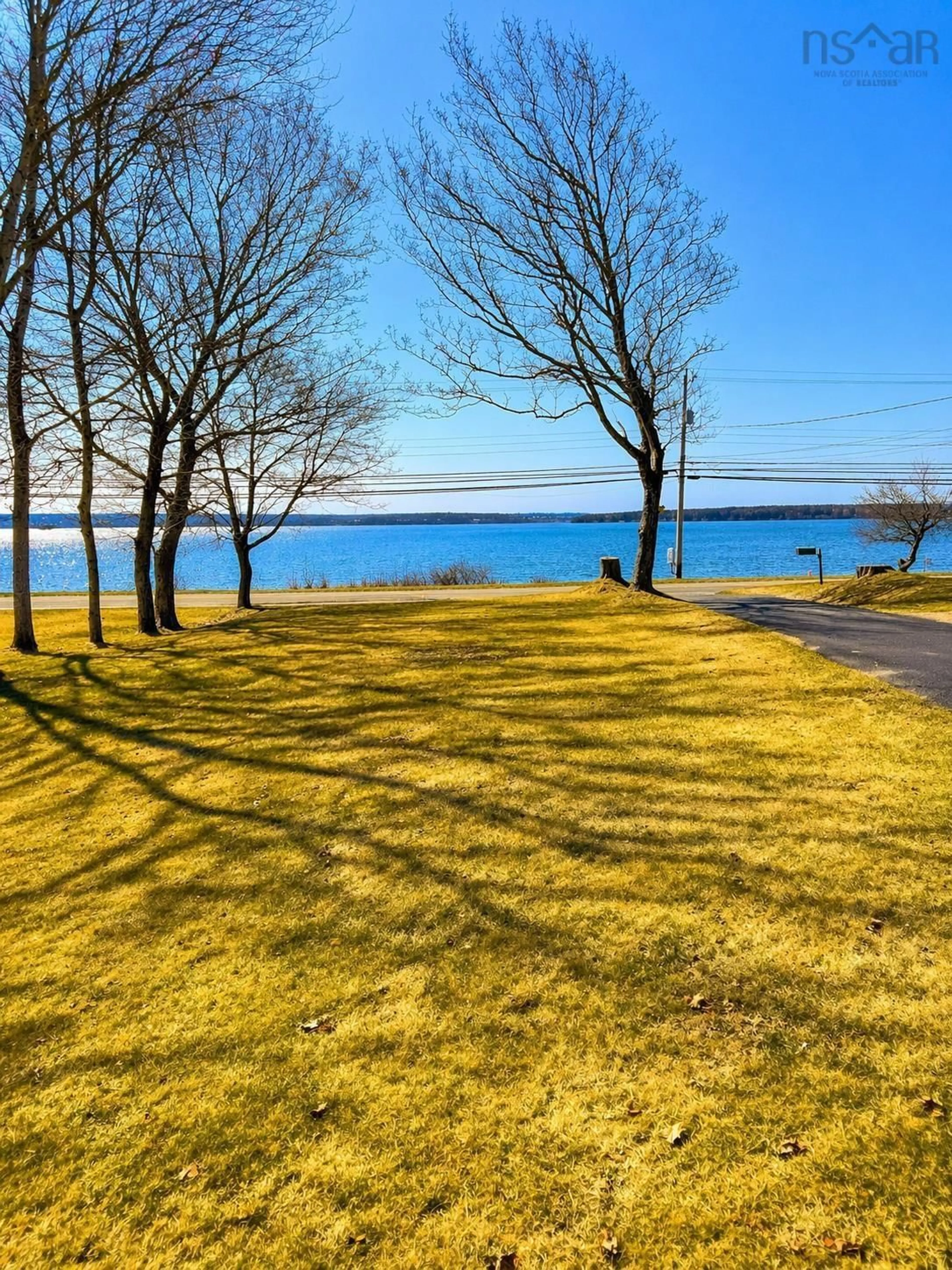 A pic from outside/outdoor area/front of a property/back of a property/a pic from drone, water/lake/river/ocean view for 92 Queen St, North Sydney Nova Scotia B2A 1A6