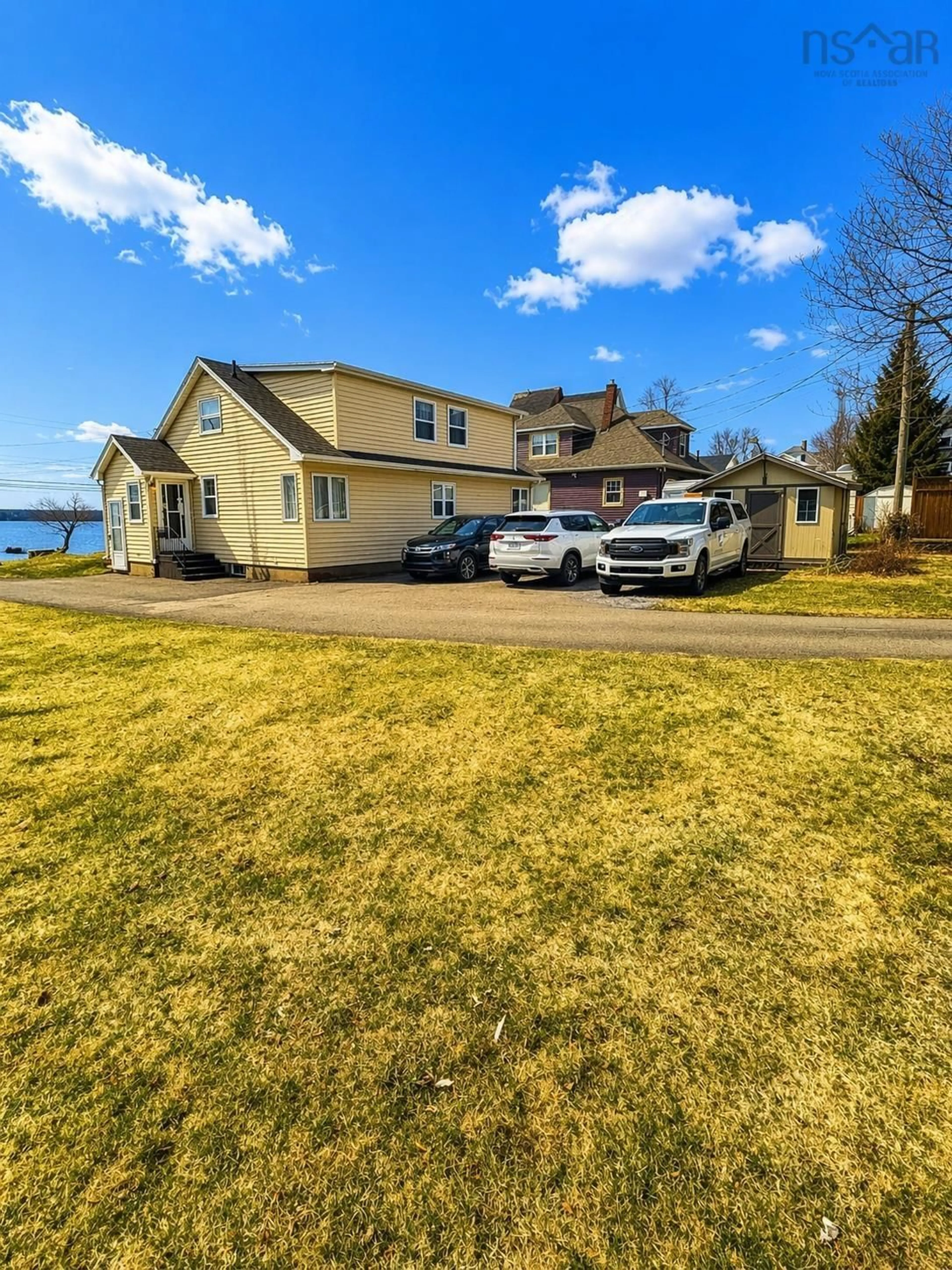 A pic from outside/outdoor area/front of a property/back of a property/a pic from drone, water/lake/river/ocean view for 92 Queen St, North Sydney Nova Scotia B2A 1A6