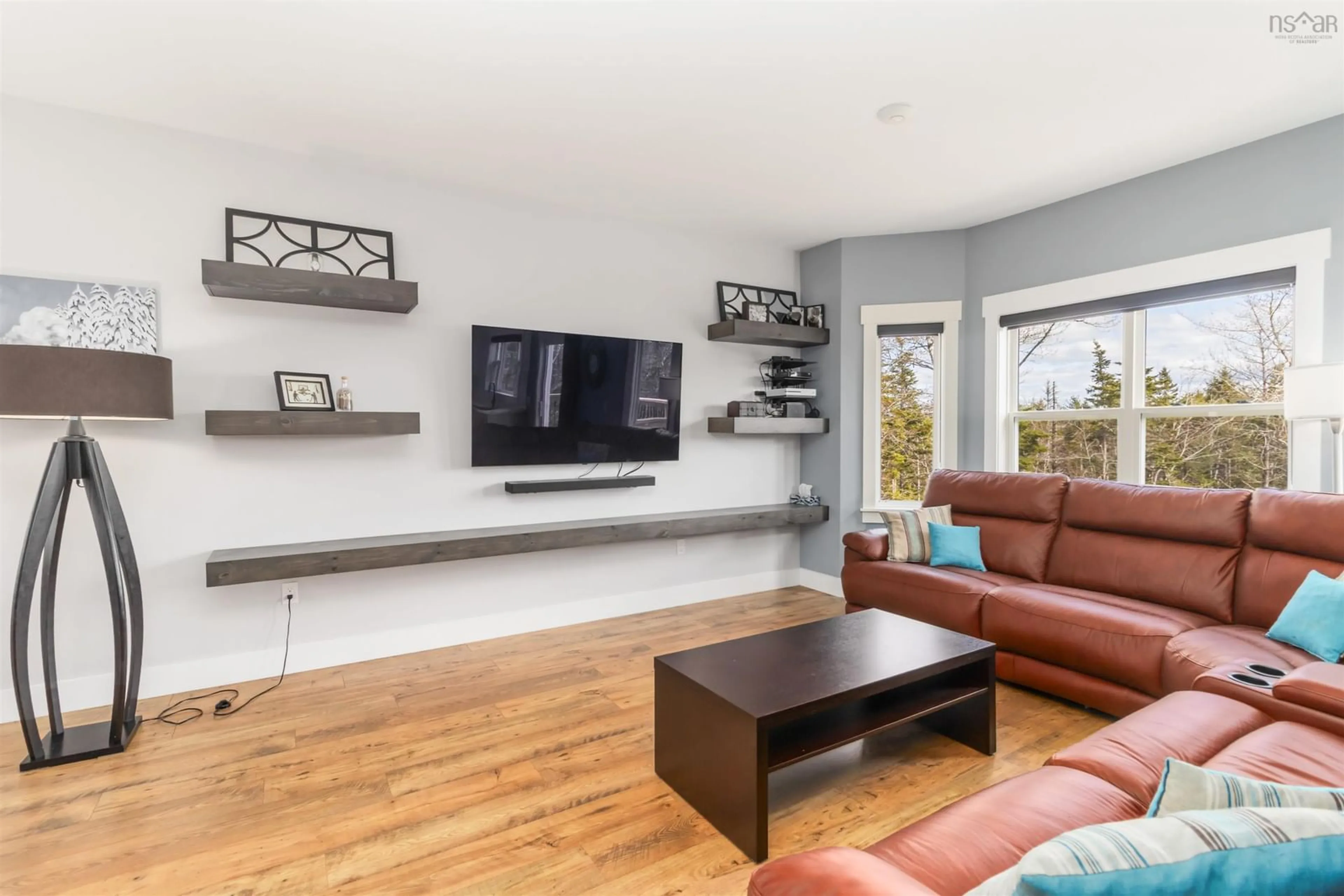 Living room with furniture, wood/laminate floor for 558 Goldeneye Dr, Timberlea Nova Scotia B3T 0E6