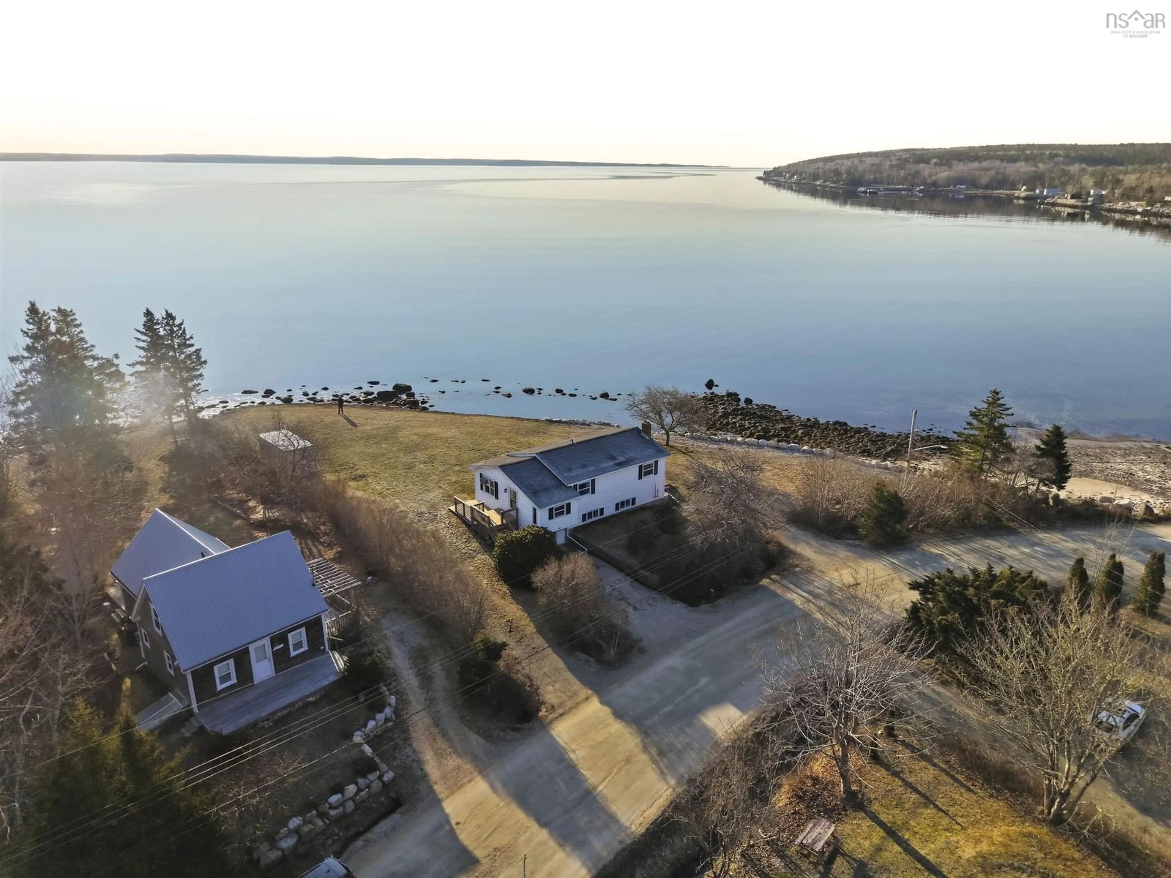 A pic from outside/outdoor area/front of a property/back of a property/a pic from drone, water/lake/river/ocean view for 65 Mill Cove Shore Roads, Hubbards Nova Scotia B0J 1T0