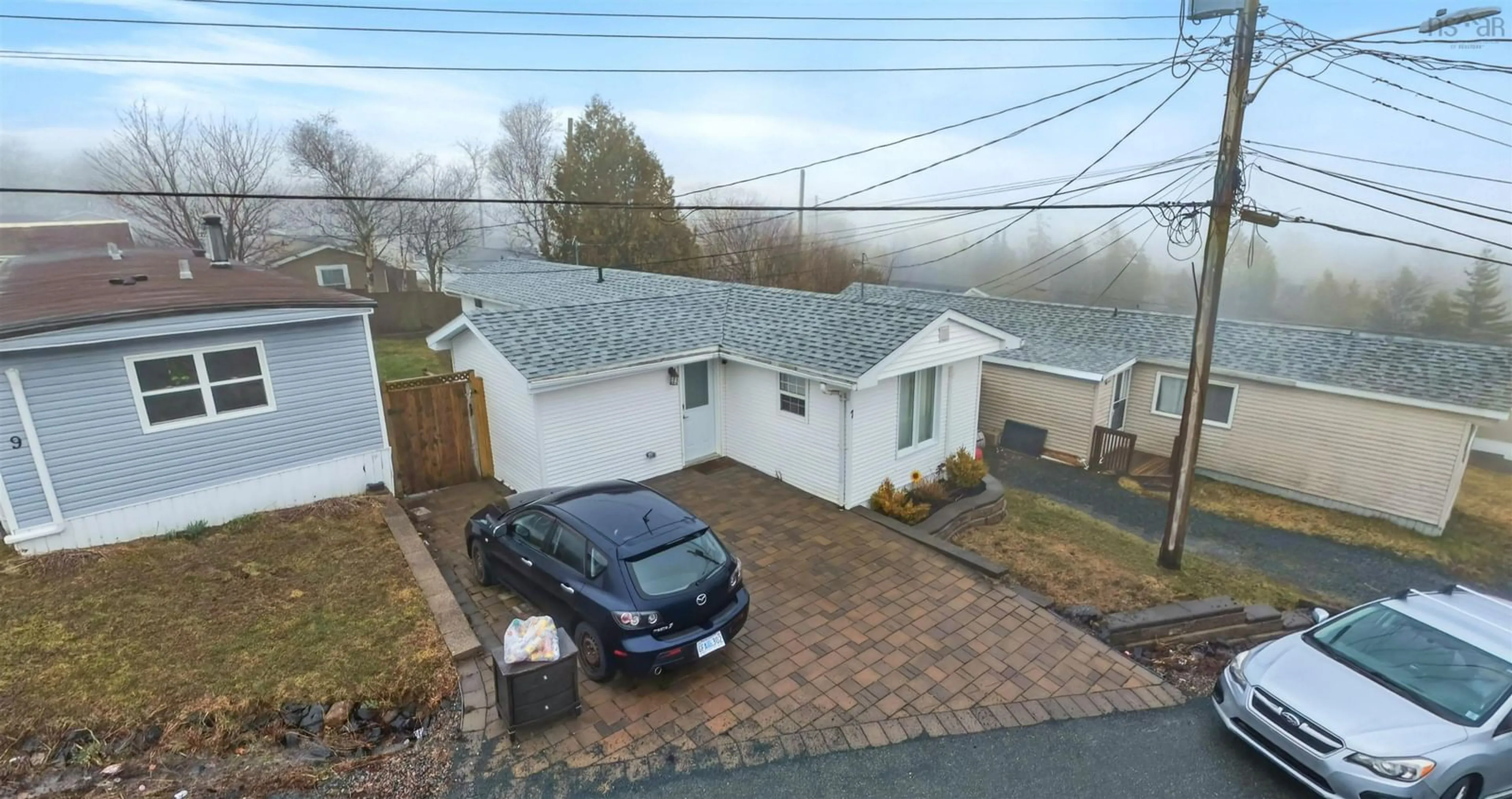 A pic from outside/outdoor area/front of a property/back of a property/a pic from drone, street for 7 Hillside Dr, Harrietsfield Nova Scotia B3V 1A8