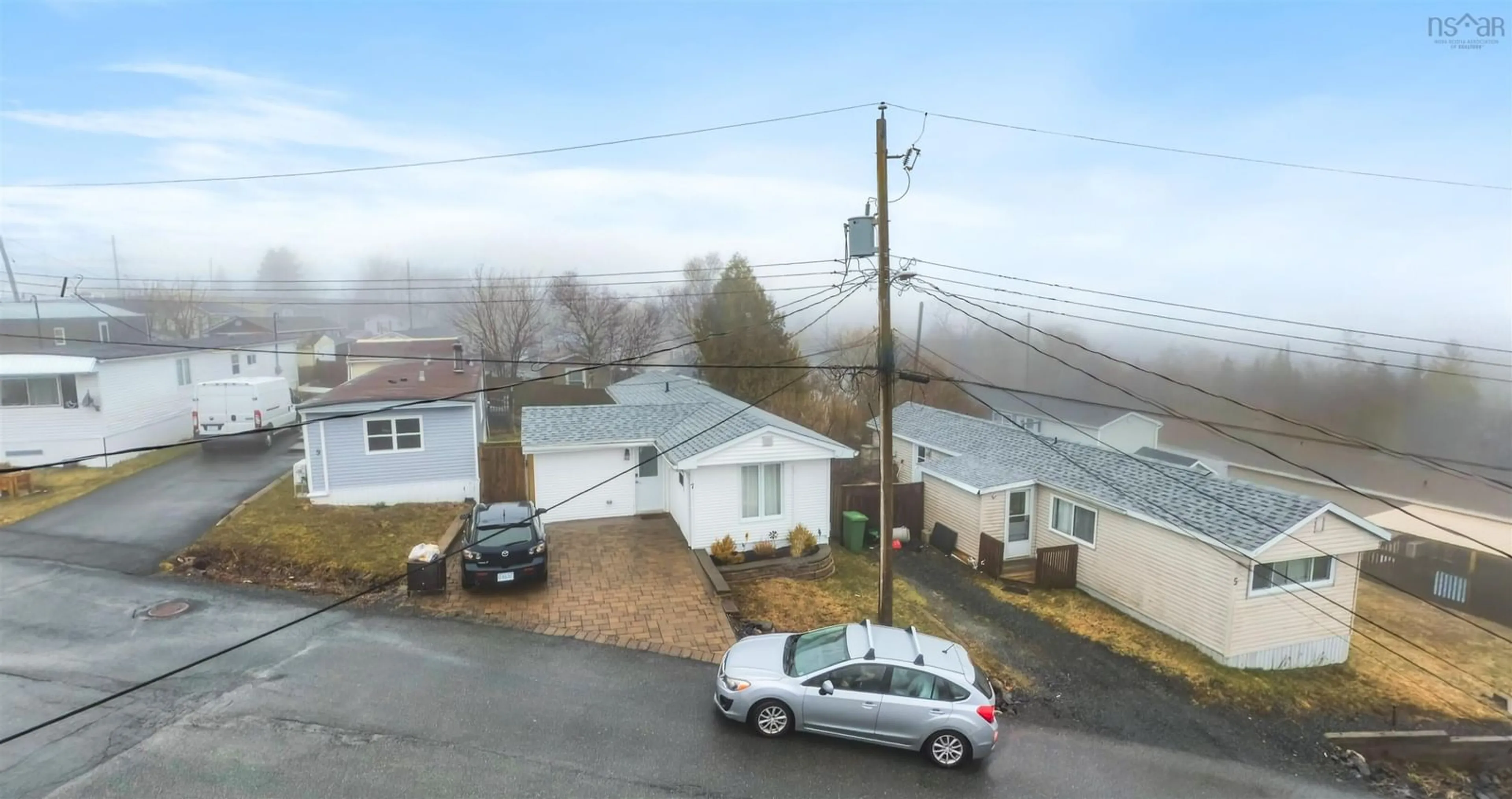 A pic from outside/outdoor area/front of a property/back of a property/a pic from drone, street for 7 Hillside Dr, Harrietsfield Nova Scotia B3V 1A8