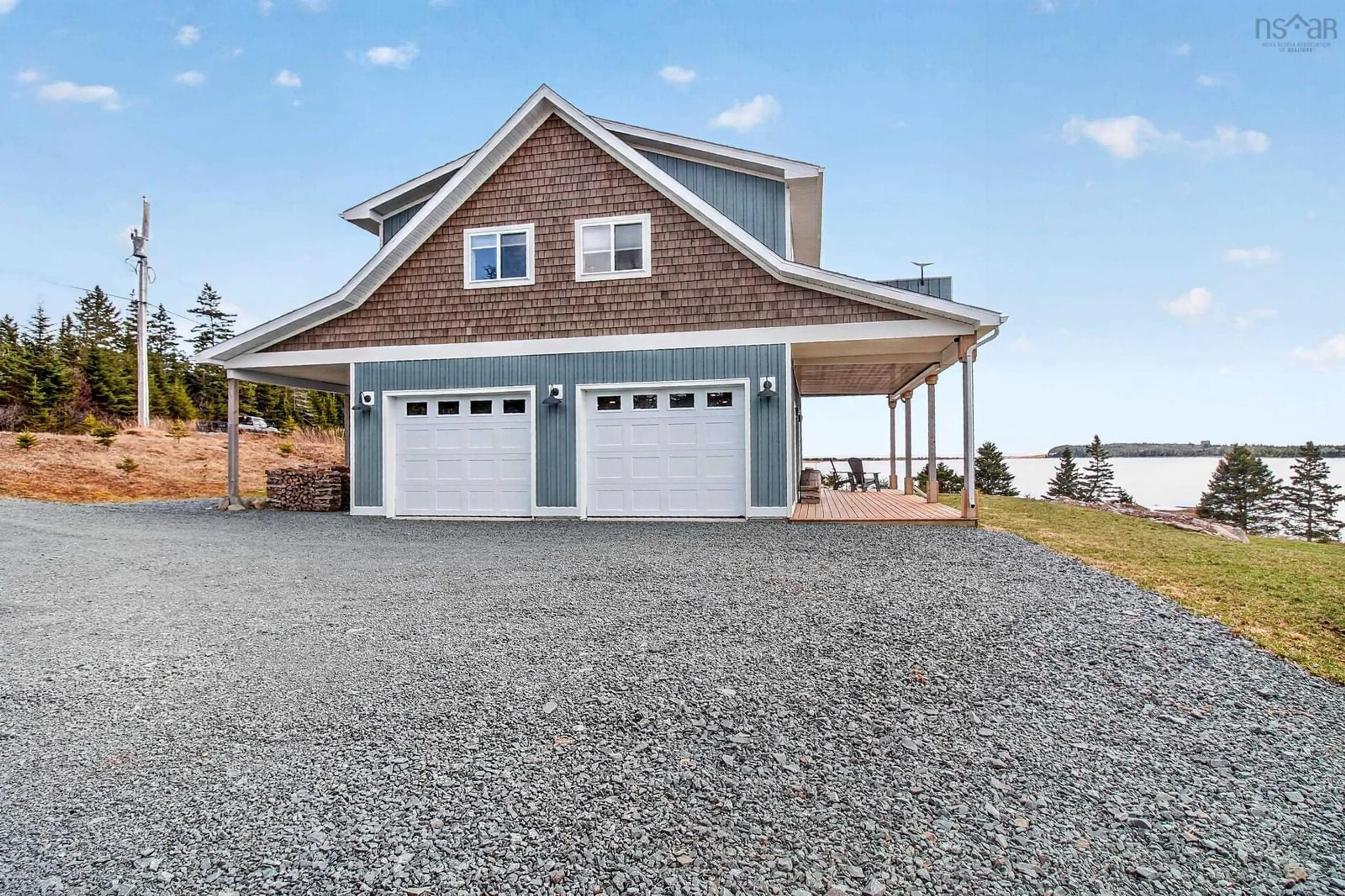 Home with vinyl exterior material, water/lake/river/ocean view for 232 Leslie Rd, East Lawrencetown Nova Scotia B2Z 1T4