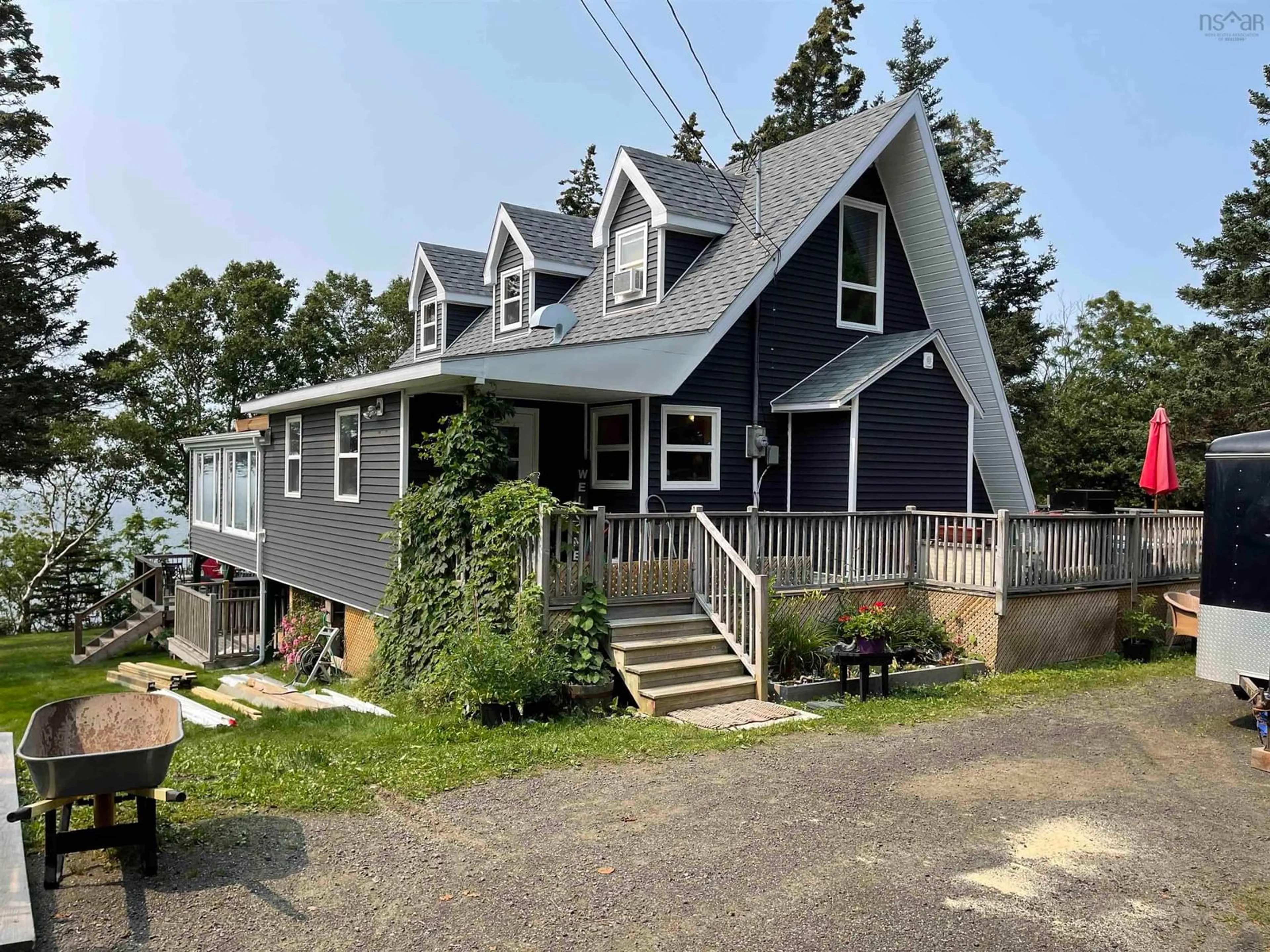 Home with vinyl exterior material, street for 7055 Highway 101, Plympton Nova Scotia B0W 2R0