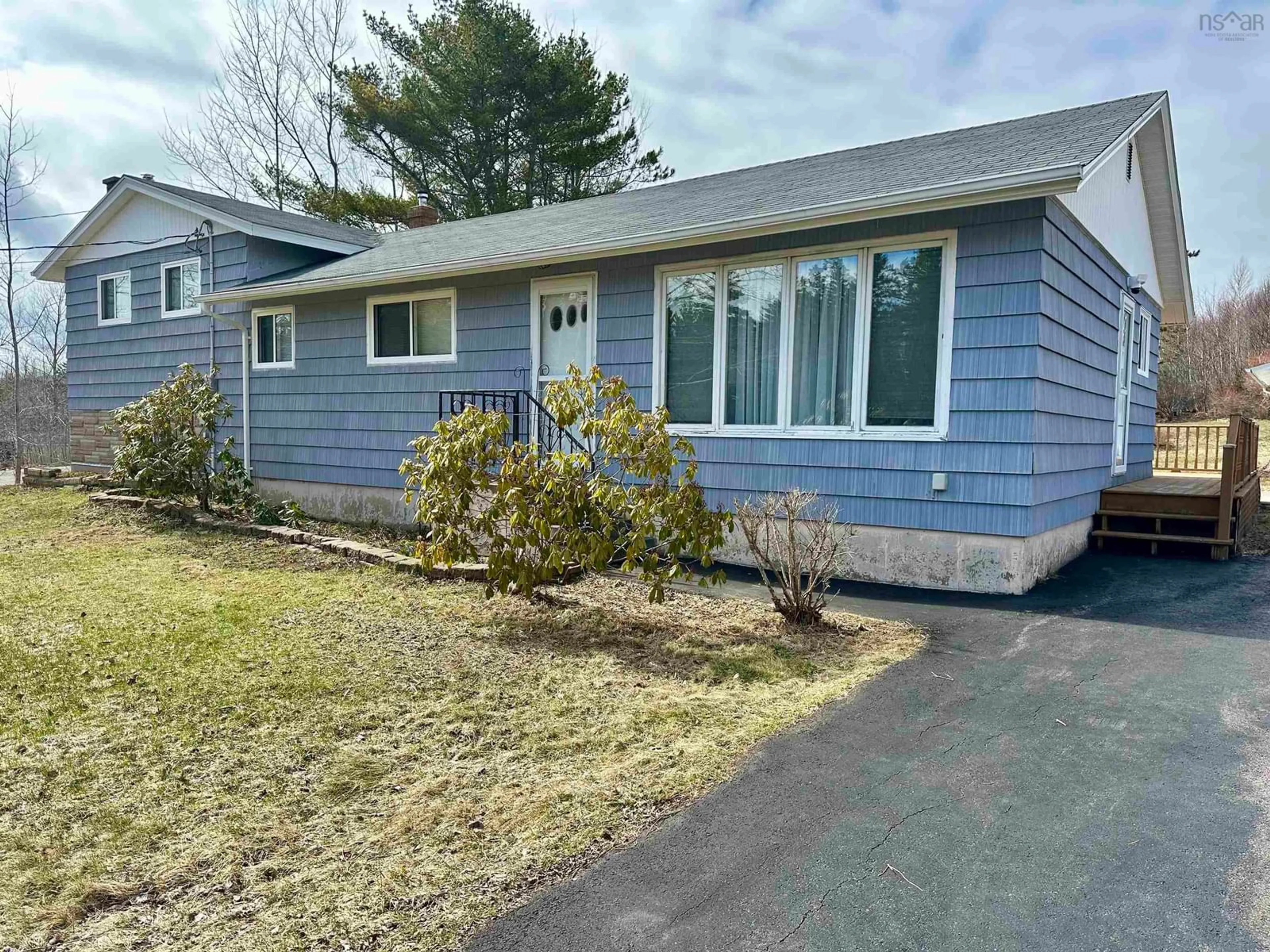 Home with vinyl exterior material, street for Kings Rd #51, Port Hastings Nova Scotia B9A 1N9