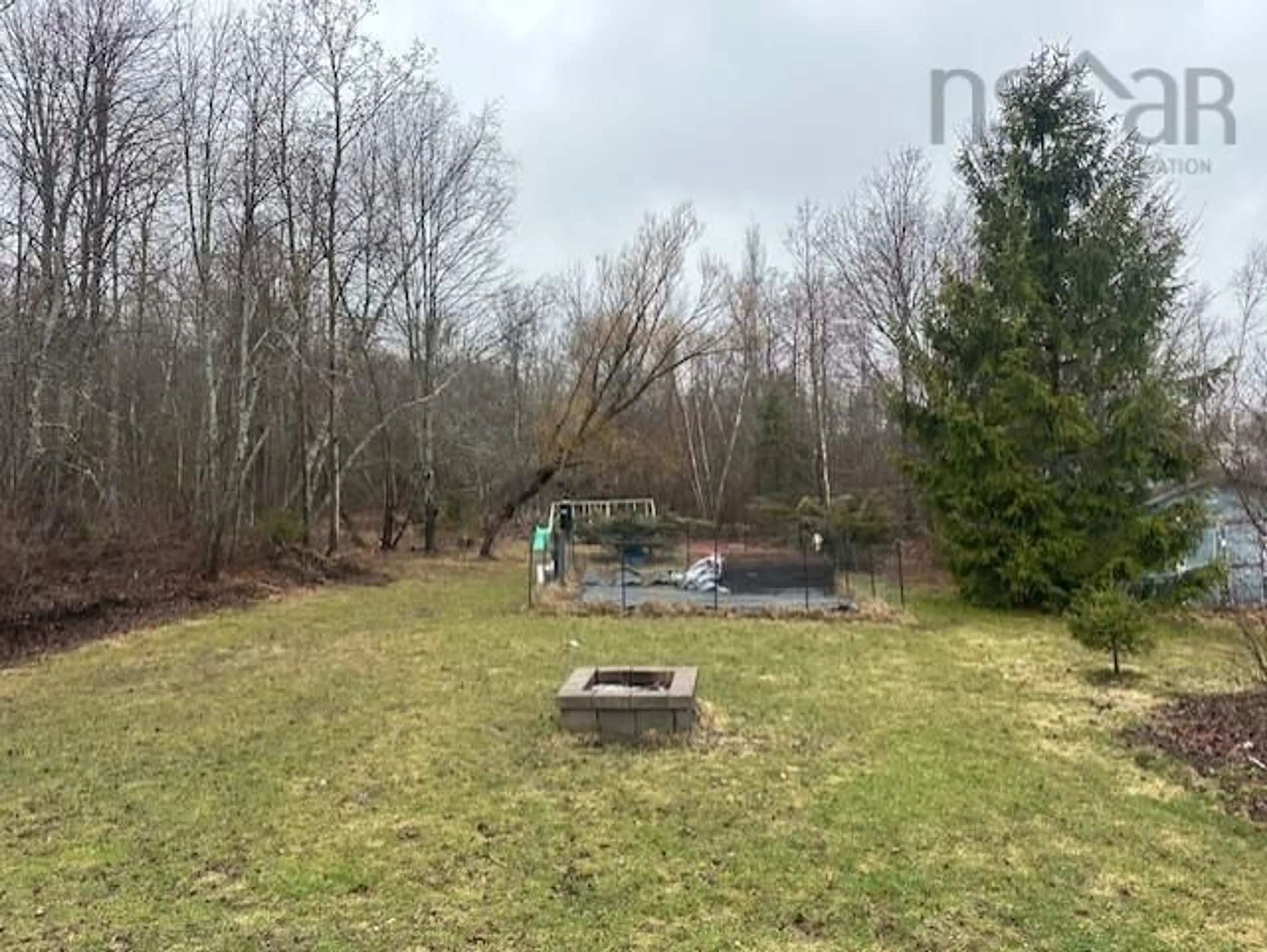 A pic from outside/outdoor area/front of a property/back of a property/a pic from drone, forest/trees view for 1554 North Main St, Westville Nova Scotia B0K 2A0