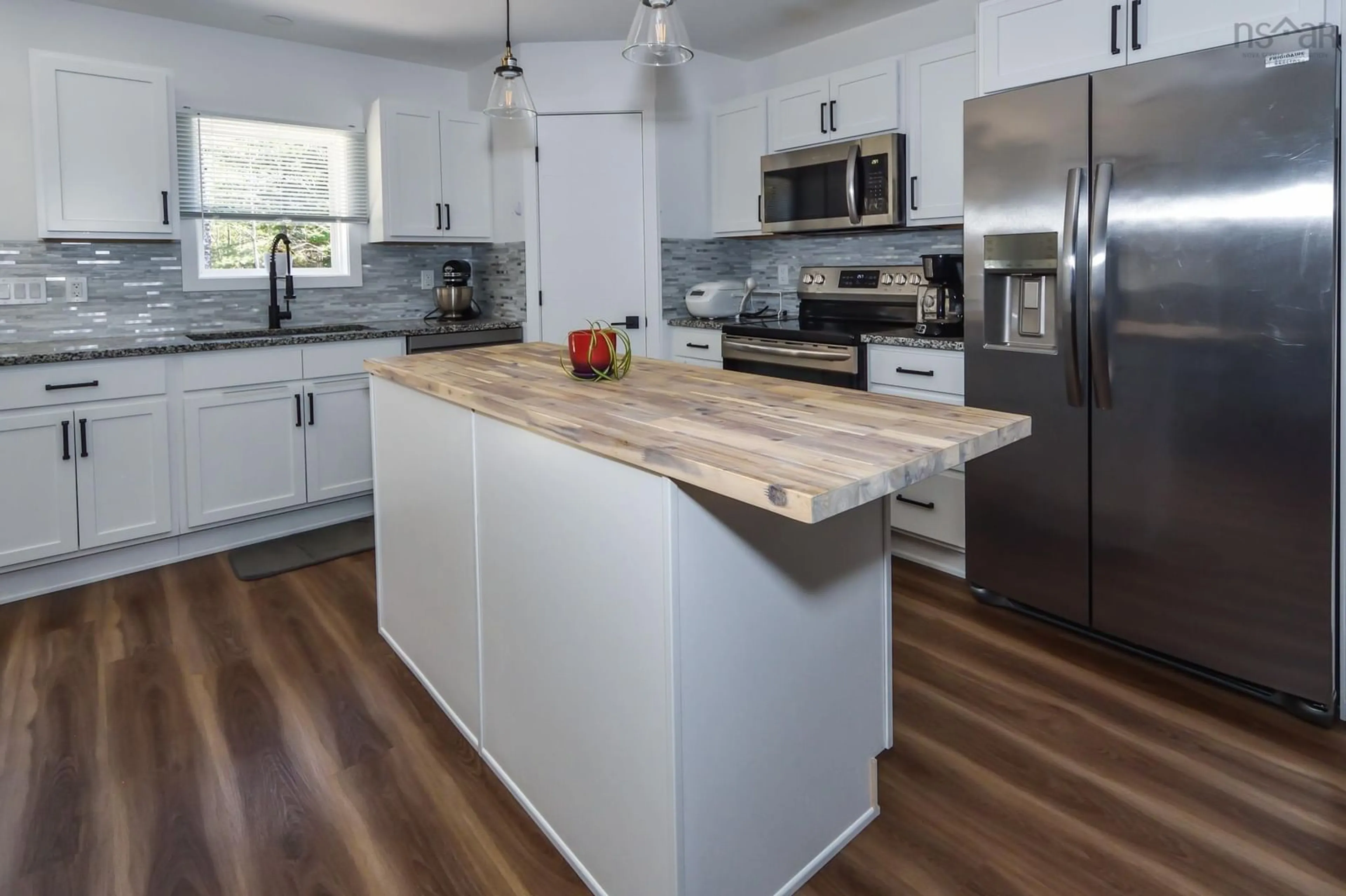 Open concept kitchen, wood/laminate floor for 220 Feeners Corner Rd, West Northfield Nova Scotia B4V 5E3