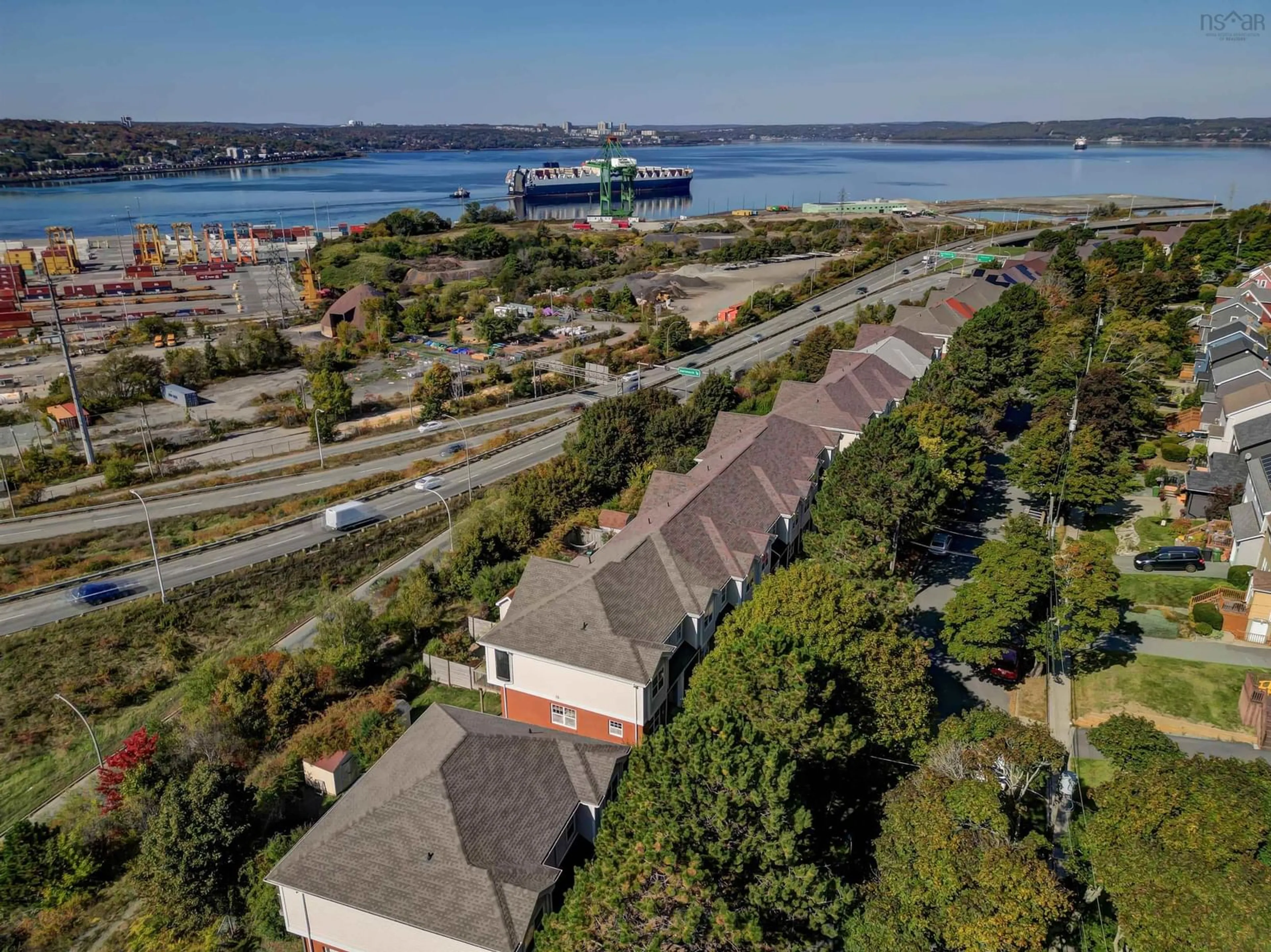 A pic from outside/outdoor area/front of a property/back of a property/a pic from drone, water/lake/river/ocean view for 3752 Memorial Dr, Halifax Nova Scotia B3K 6R6