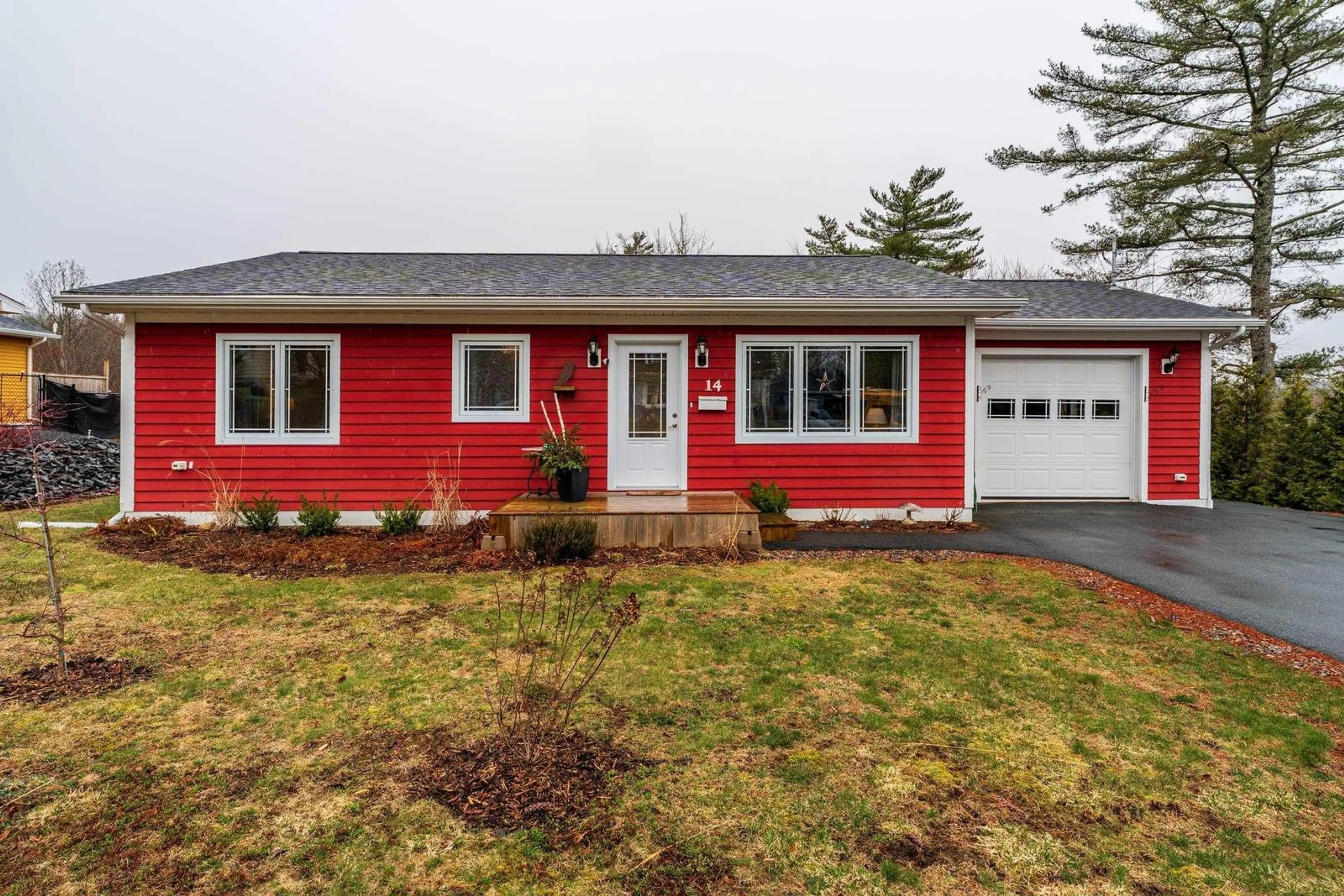 Home with vinyl exterior material, street for 14 Hillside Dr, Bridgewater Nova Scotia B4V 3C7