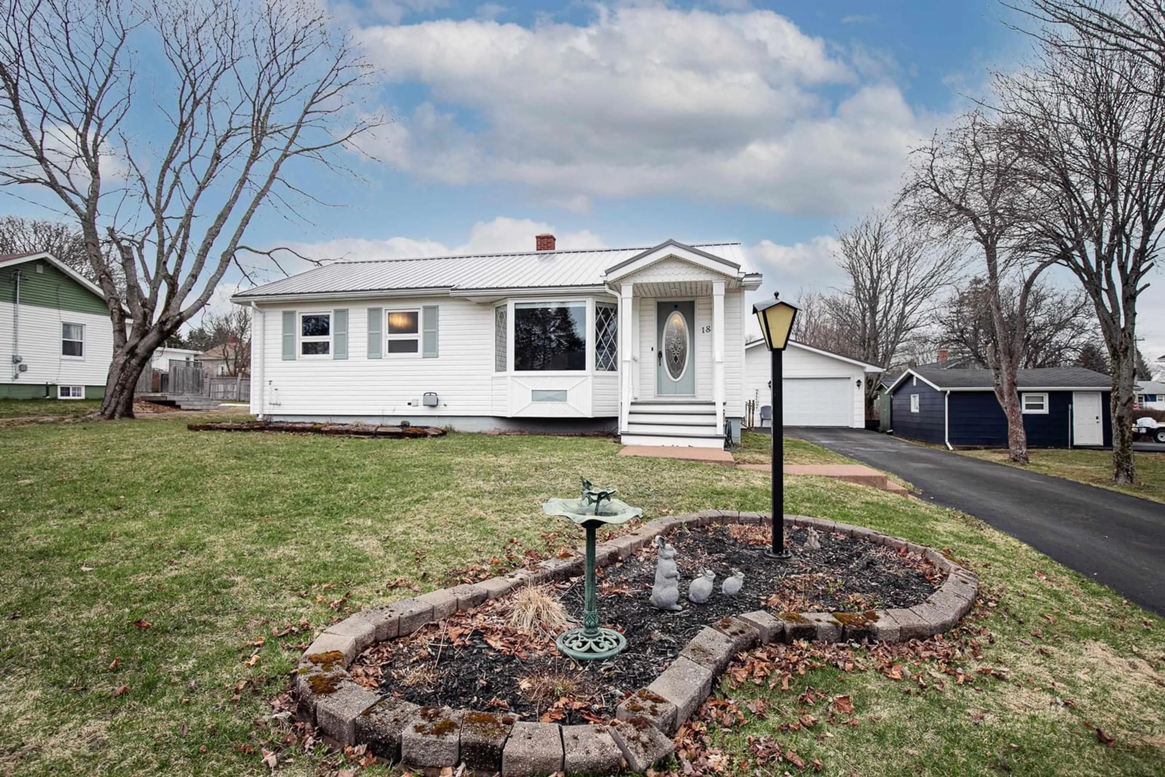 Home with vinyl exterior material, street for 18 Boylston Ave, Amherst Nova Scotia B4H 3X1