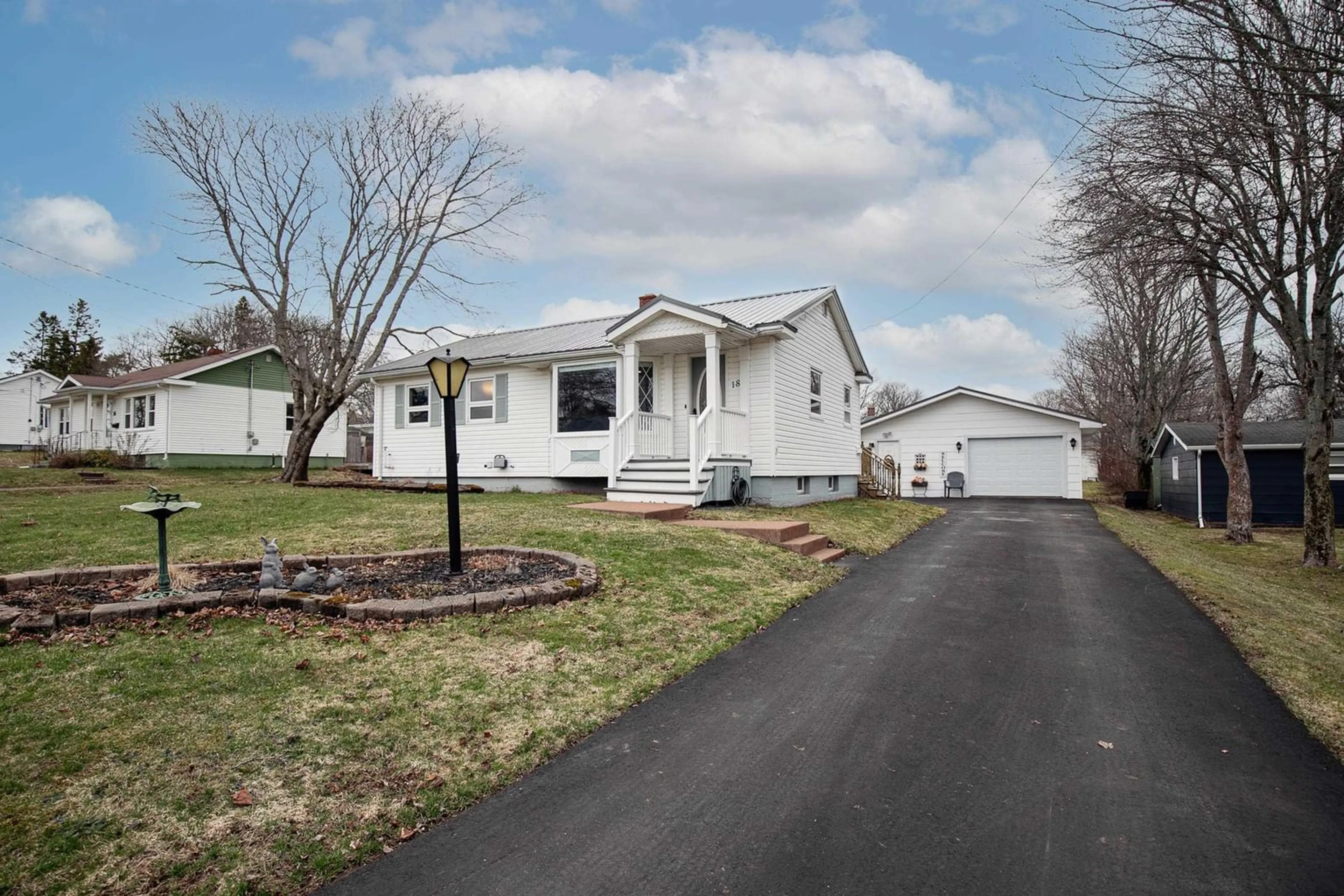 Home with vinyl exterior material, street for 18 Boylston Ave, Amherst Nova Scotia B4H 3X1