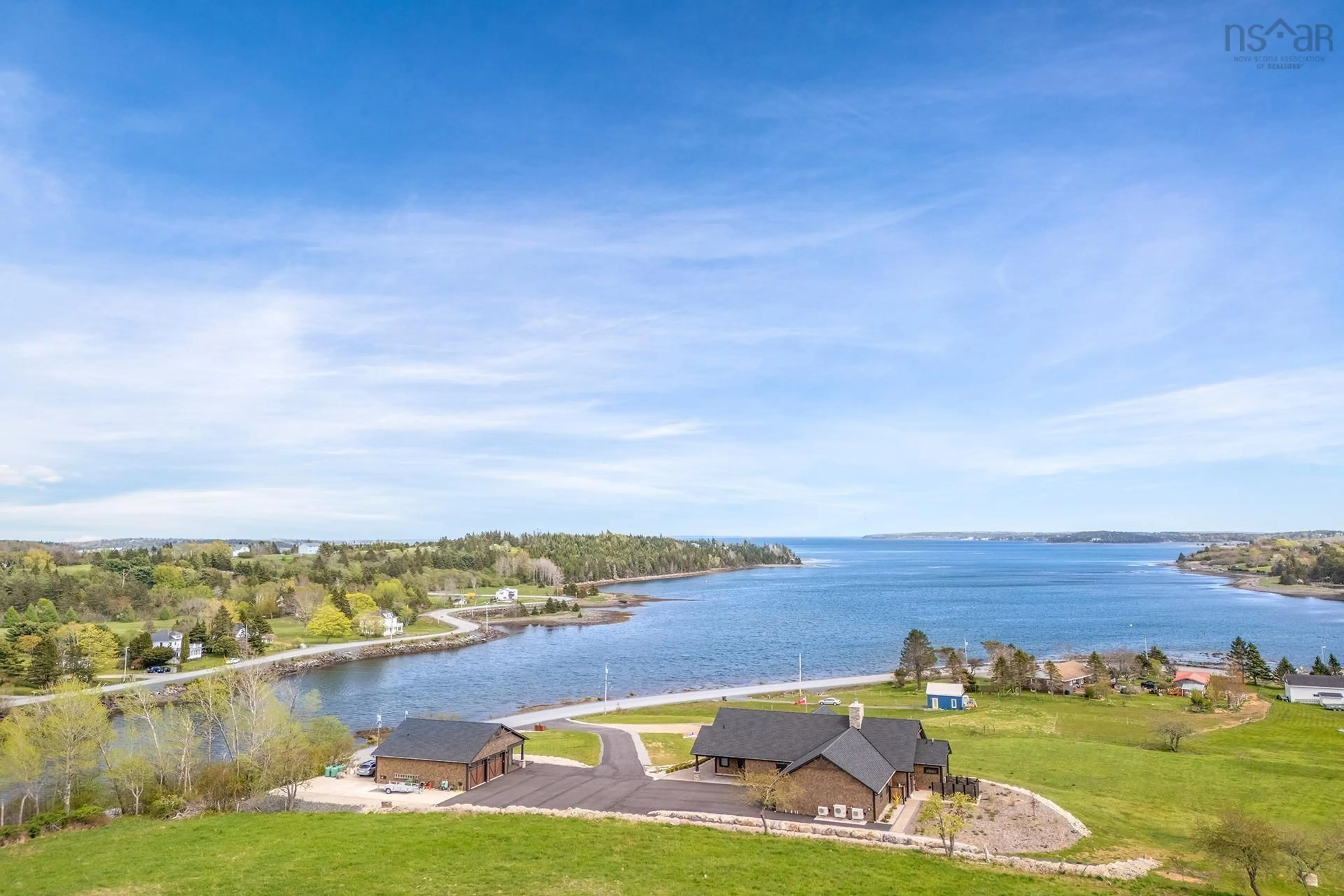 A pic from outside/outdoor area/front of a property/back of a property/a pic from drone, water/lake/river/ocean view for 580 & 586 Masons Beach Rd, First South Nova Scotia B0J 2C0
