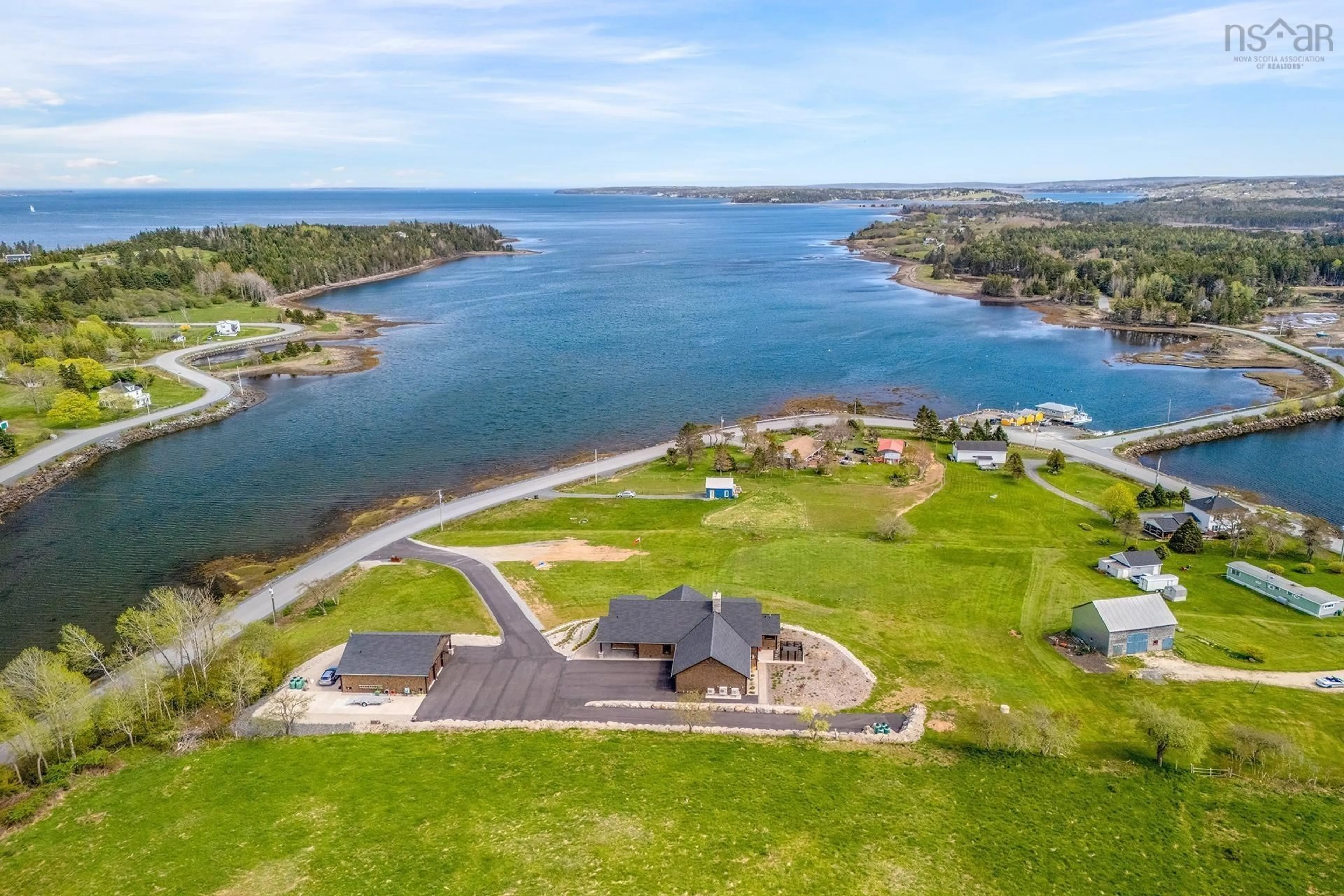 A pic from outside/outdoor area/front of a property/back of a property/a pic from drone, water/lake/river/ocean view for 580 & 586 Masons Beach Rd, First South Nova Scotia B0J 2C0
