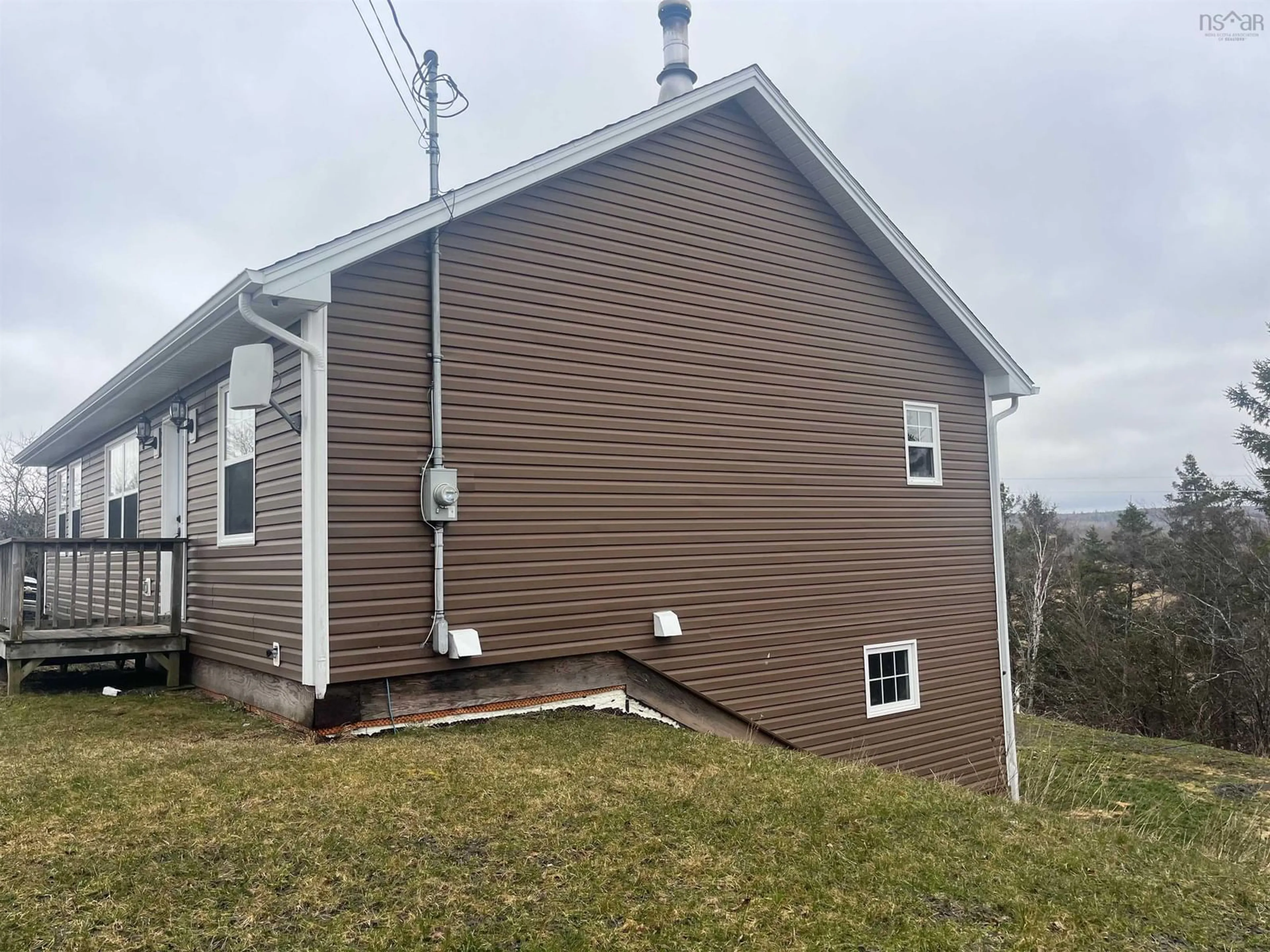 Home with vinyl exterior material, building for 210 Blacksmith Valley Rd, St Andrew's Nova Scotia B0H 1X0