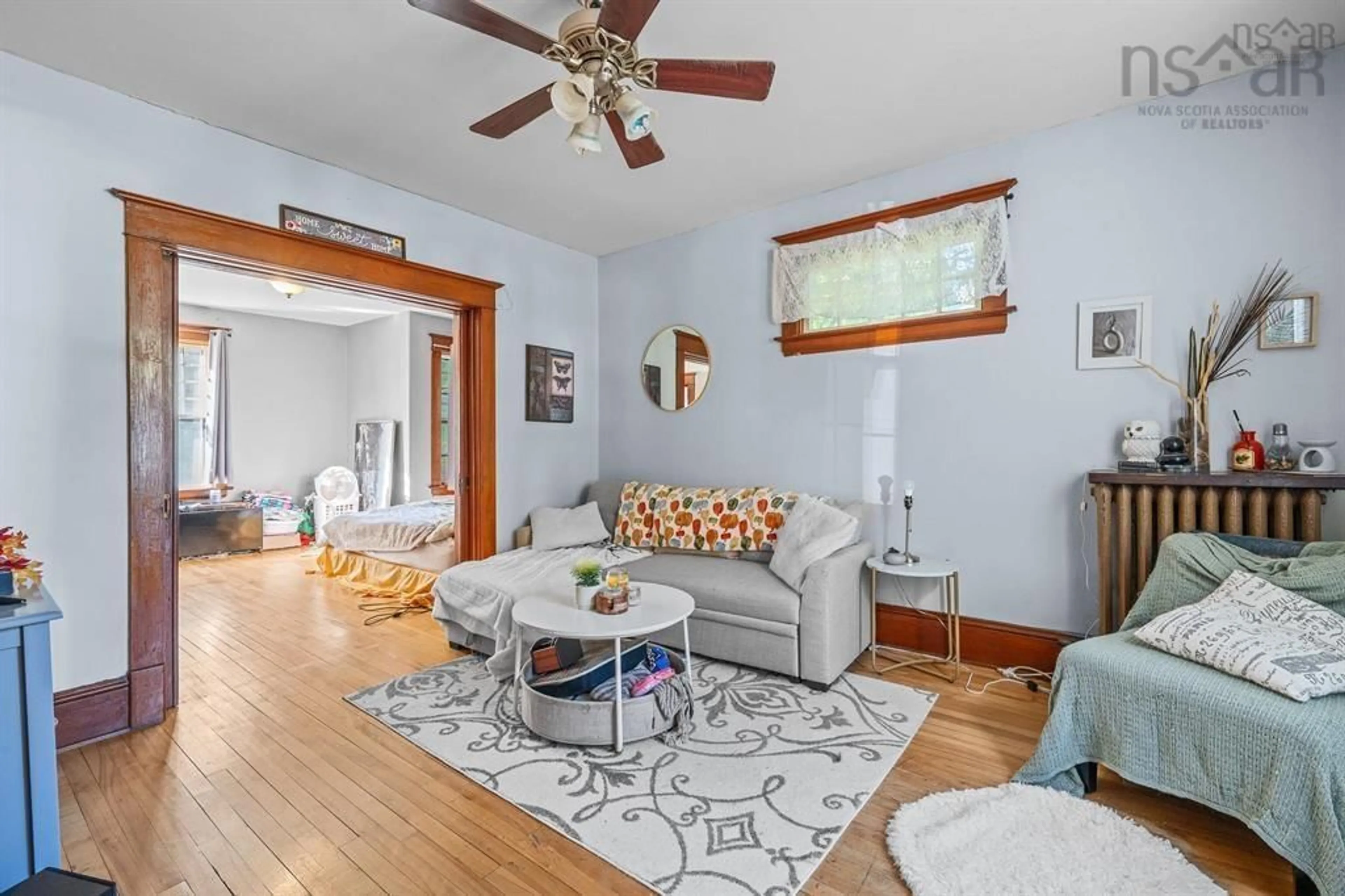 Living room with furniture, wood/laminate floor for 217-219 Albert St, New Glasgow Nova Scotia B2H 3V6