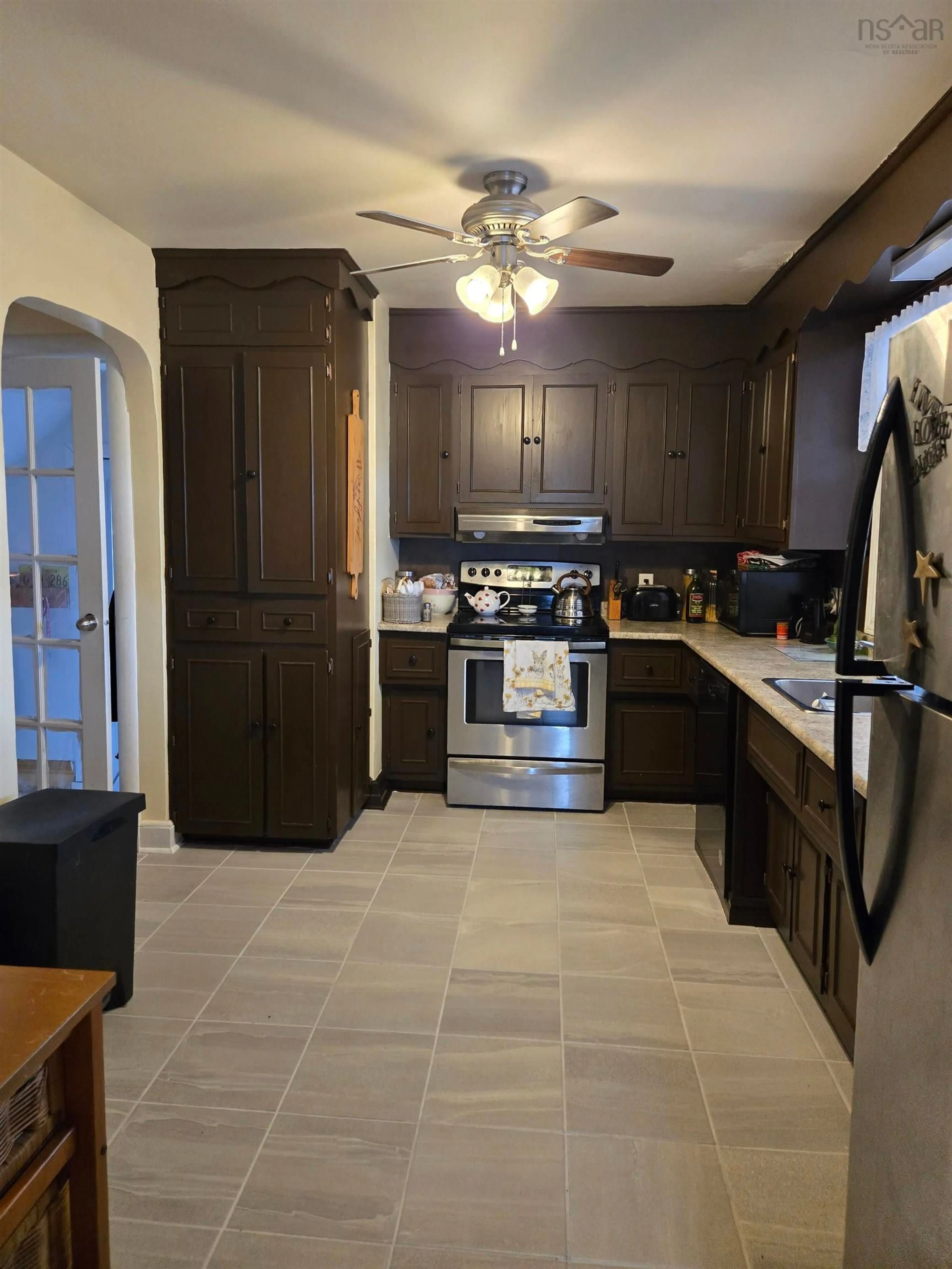 Open concept kitchen, ceramic/tile floor for 87 Harold Street St, Sydney Nova Scotia B1P 3M2