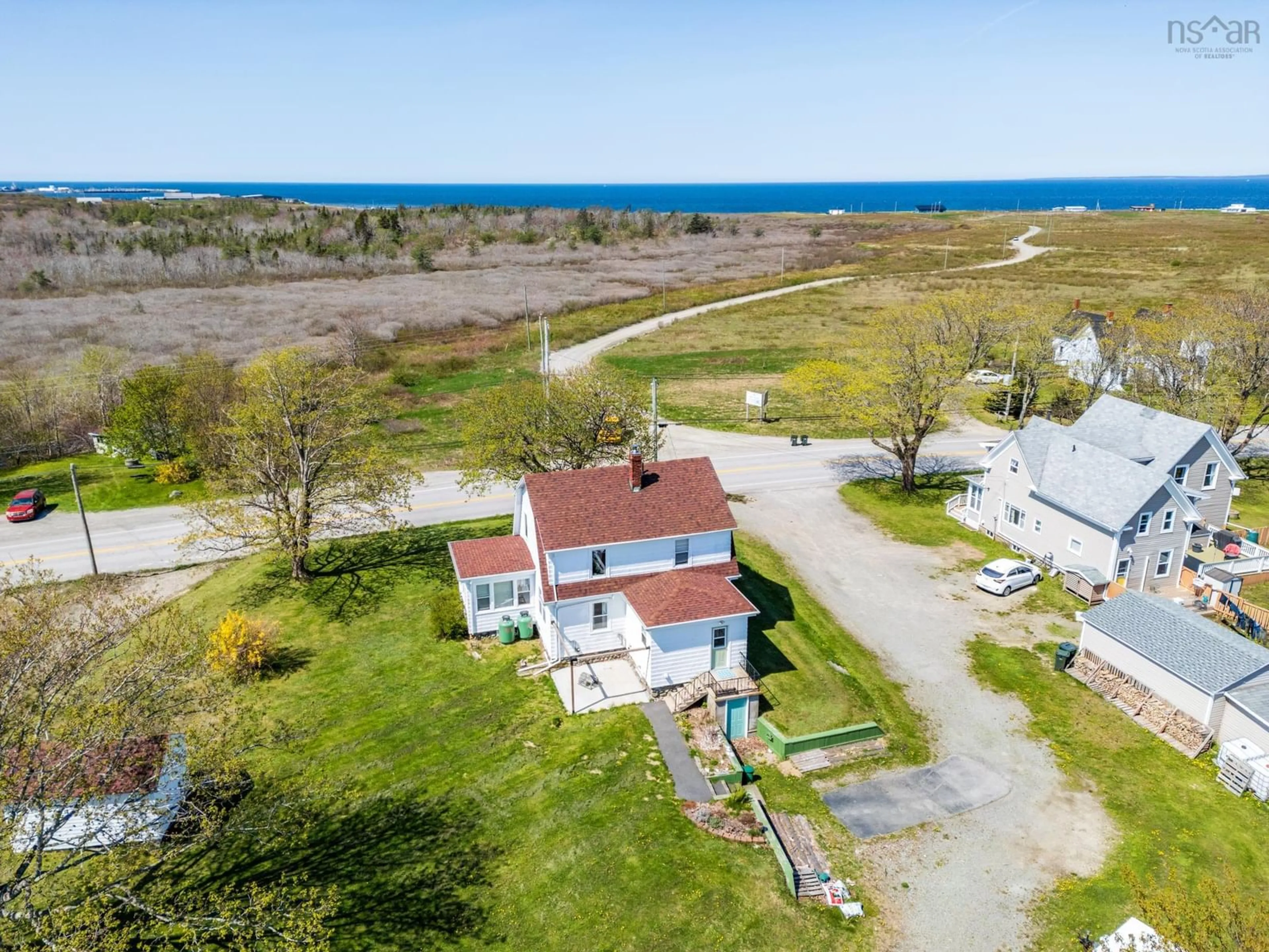 A pic from outside/outdoor area/front of a property/back of a property/a pic from drone, water/lake/river/ocean view for 8882 Highway 1, Meteghan River Nova Scotia B0W 2L0