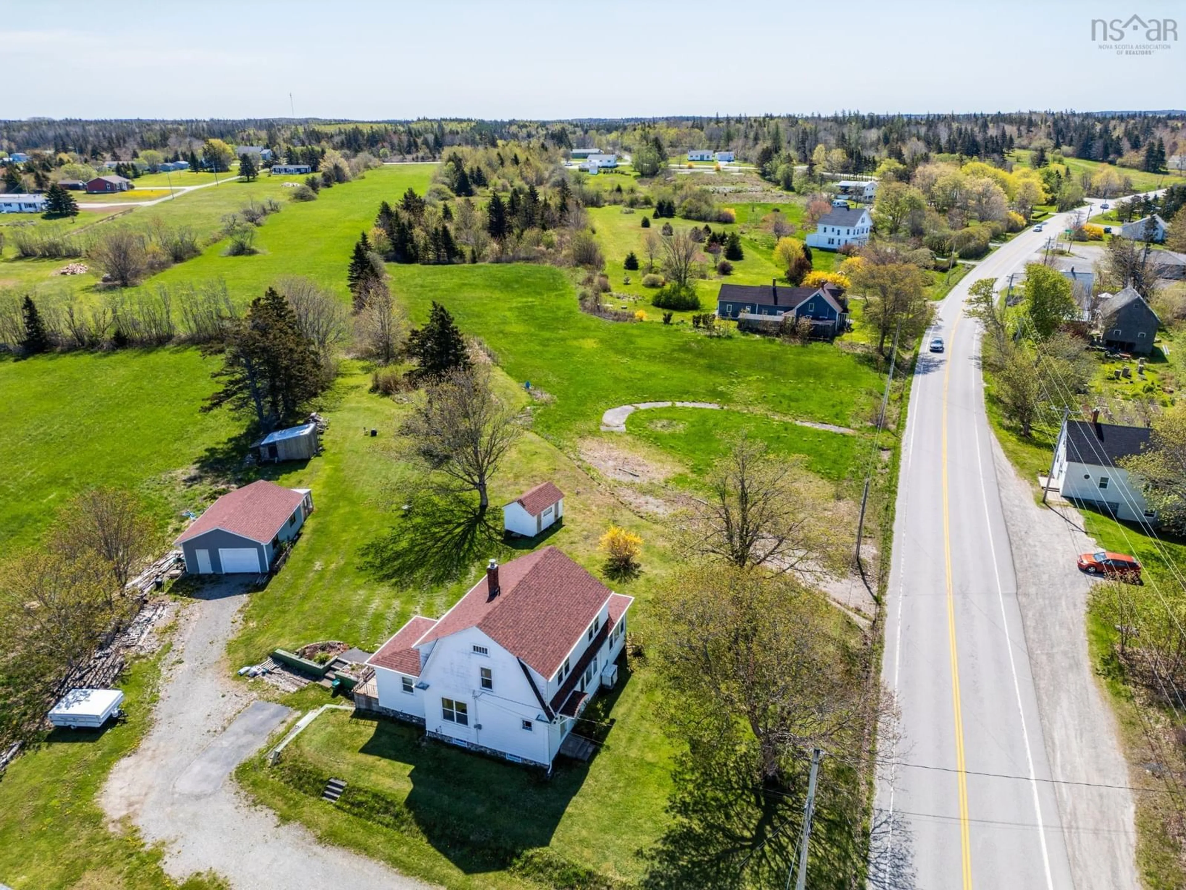 A pic from outside/outdoor area/front of a property/back of a property/a pic from drone, street for 8882 Highway 1, Meteghan River Nova Scotia B0W 2L0