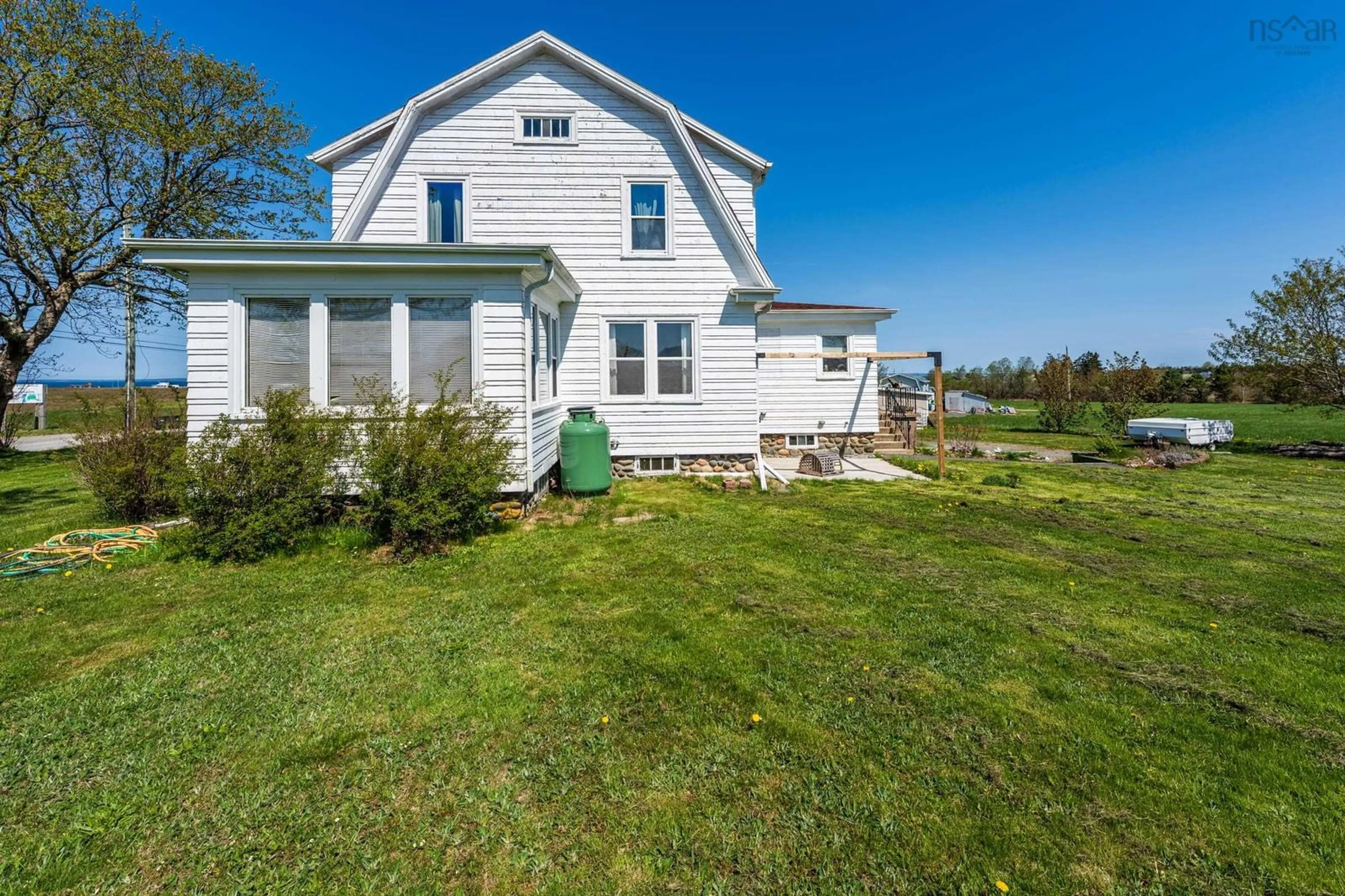 A pic from outside/outdoor area/front of a property/back of a property/a pic from drone, water/lake/river/ocean view for 8882 Highway 1, Meteghan River Nova Scotia B0W 2L0