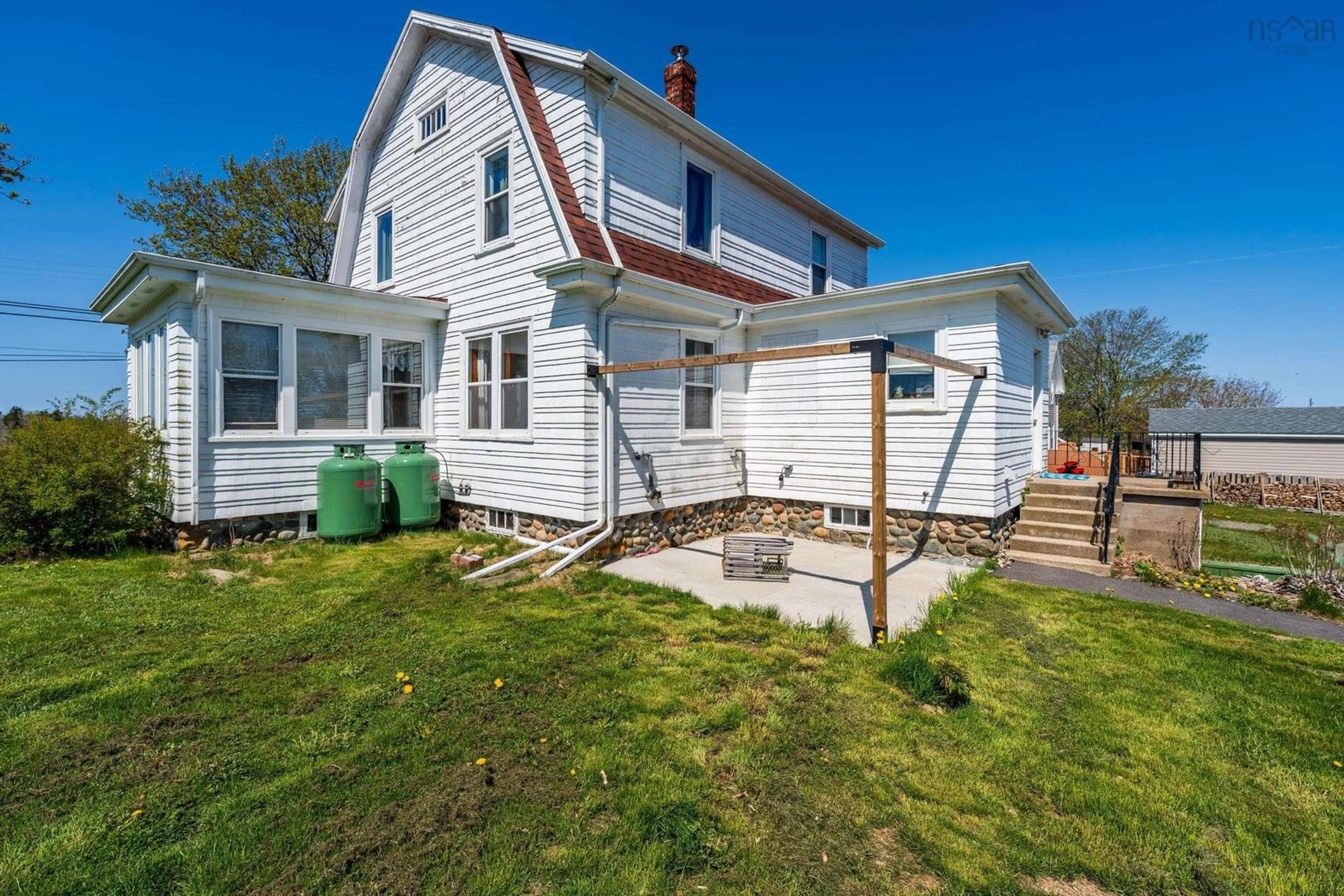 Home with vinyl exterior material, street for 8882 Highway 1, Meteghan River Nova Scotia B0W 2L0