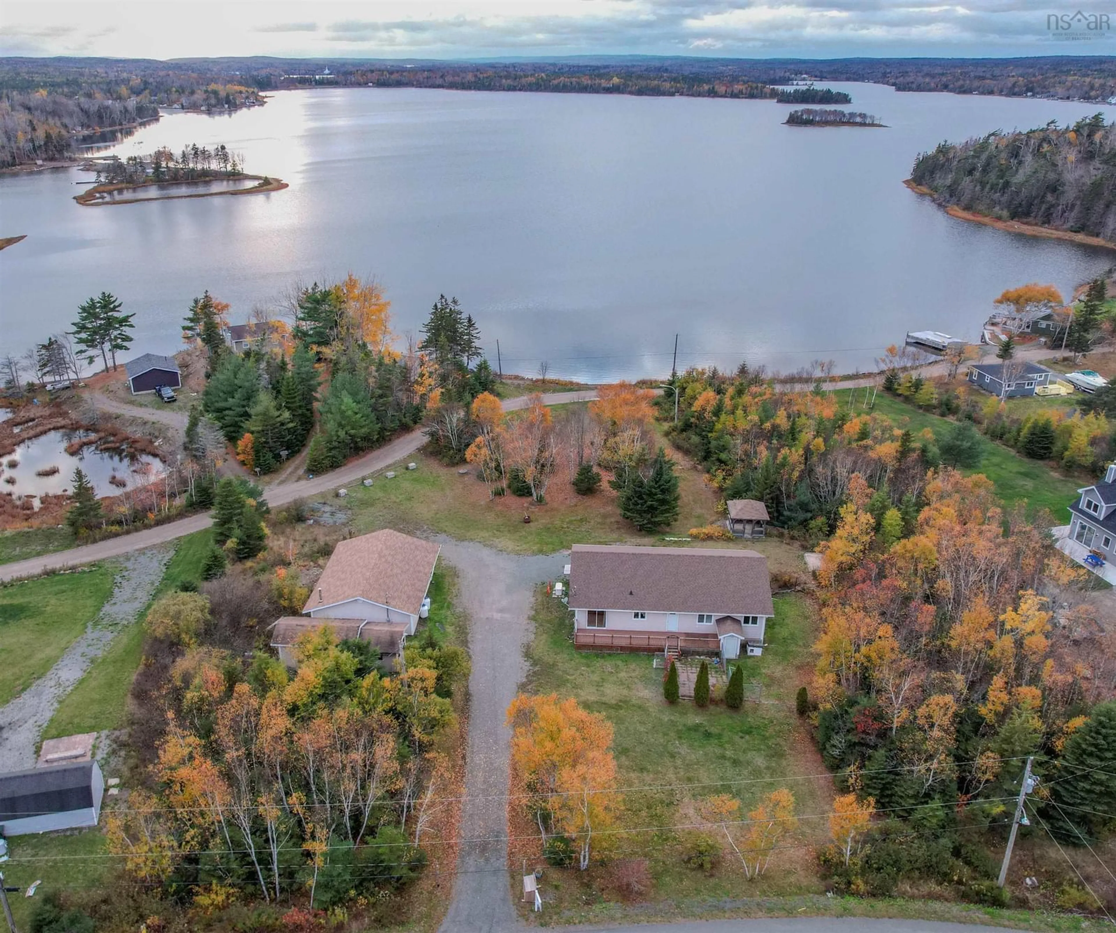 A pic from outside/outdoor area/front of a property/back of a property/a pic from drone, water/lake/river/ocean view for 103 Paradise Rd, Albert Bridge Nova Scotia B1K 3R4