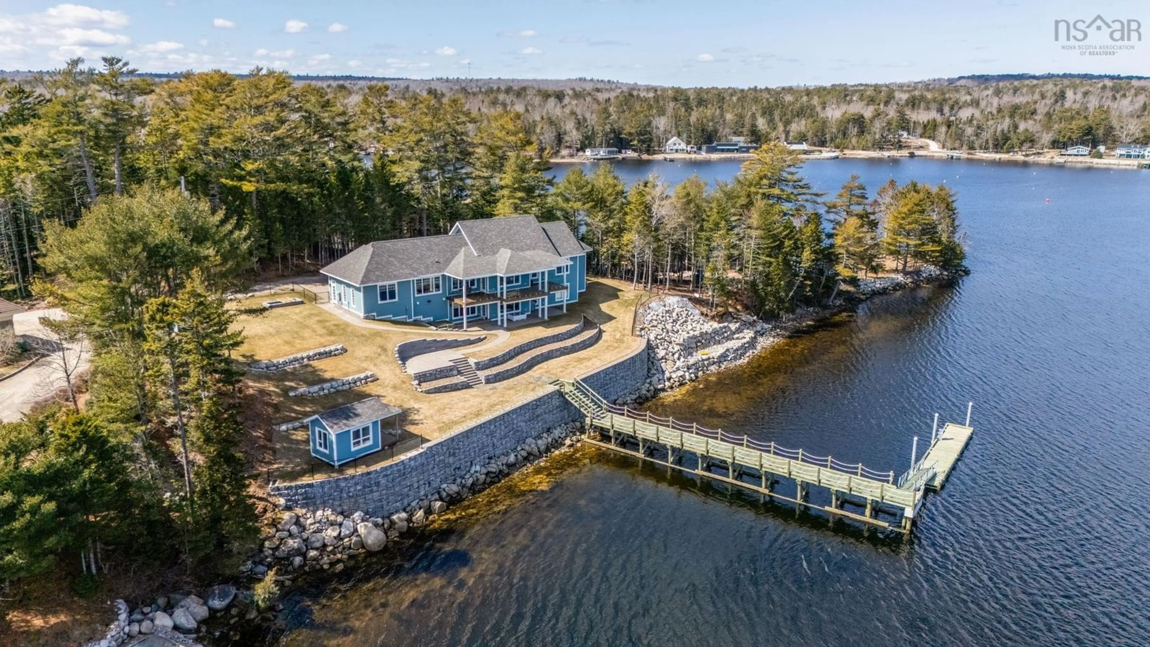 A pic from outside/outdoor area/front of a property/back of a property/a pic from drone, water/lake/river/ocean view for 10 Mary Lane, Marvins Island Nova Scotia B0J 1K0