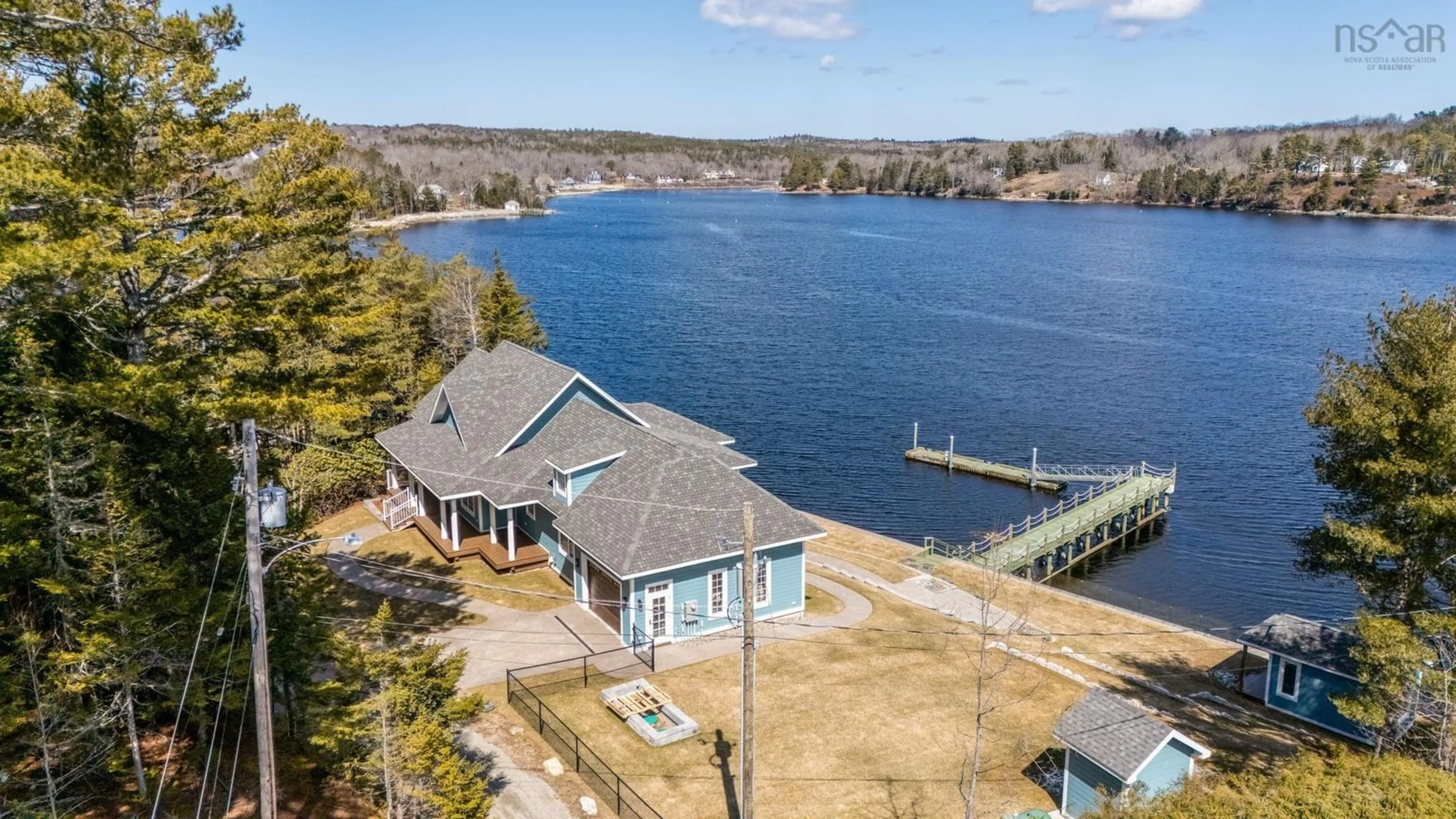A pic from outside/outdoor area/front of a property/back of a property/a pic from drone, water/lake/river/ocean view for 10 Mary Lane, Marvins Island Nova Scotia B0J 1K0