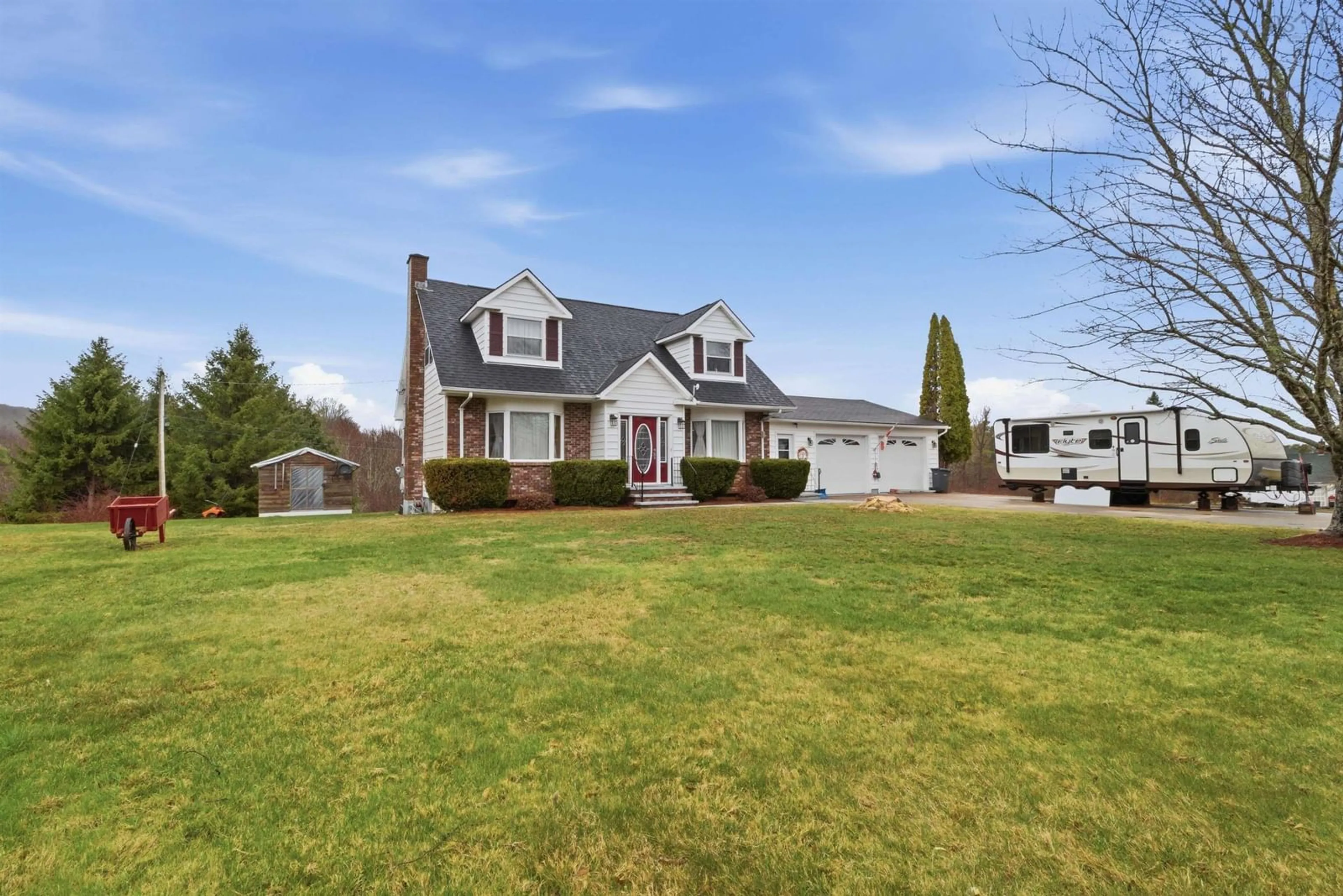 A pic from outside/outdoor area/front of a property/back of a property/a pic from drone, street for 123 Trout Lake Rd, Lawrencetown Nova Scotia B0S 1M0
