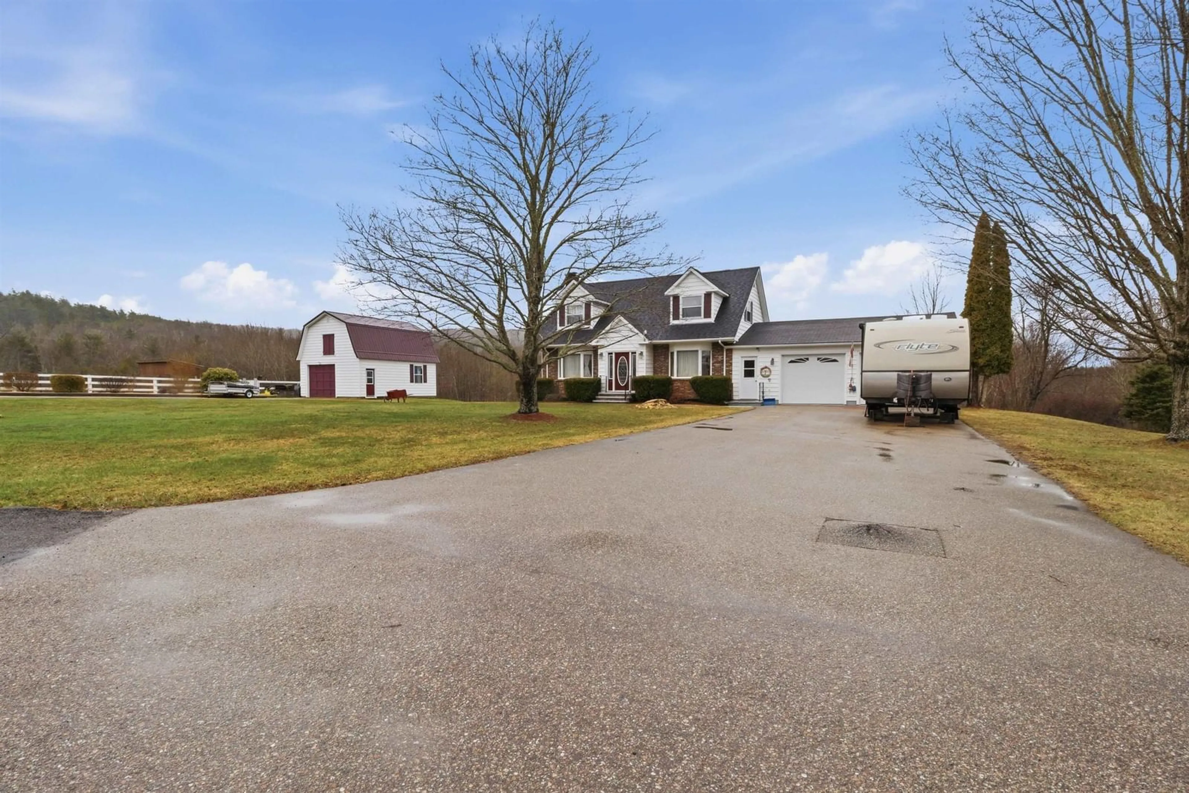 A pic from outside/outdoor area/front of a property/back of a property/a pic from drone, street for 123 Trout Lake Rd, Lawrencetown Nova Scotia B0S 1M0
