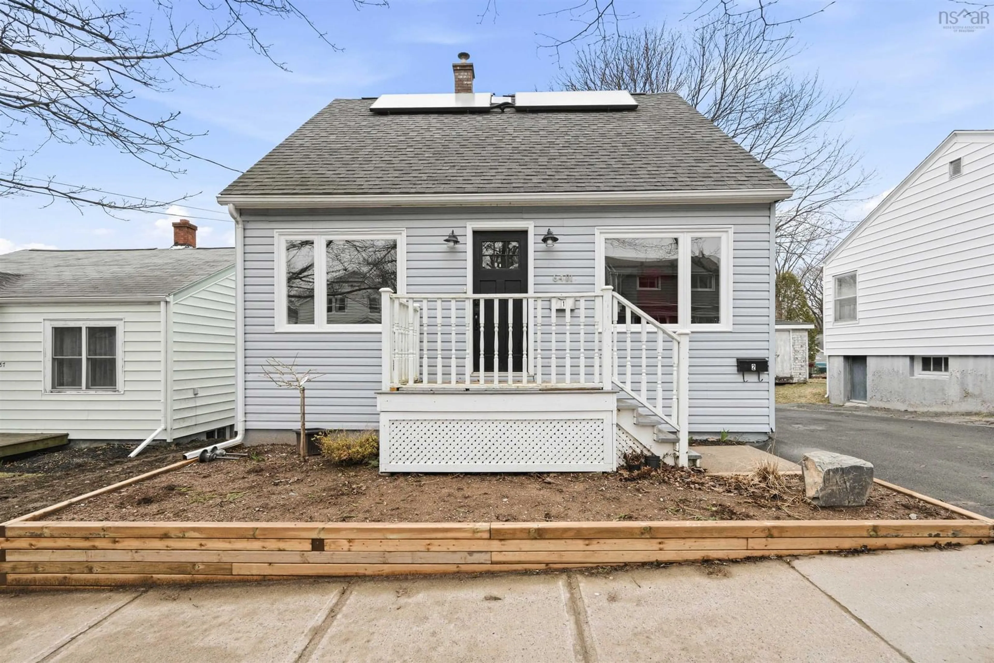 Home with vinyl exterior material, street for 6481 Liverpool St, Halifax Nova Scotia B3L 1Y3