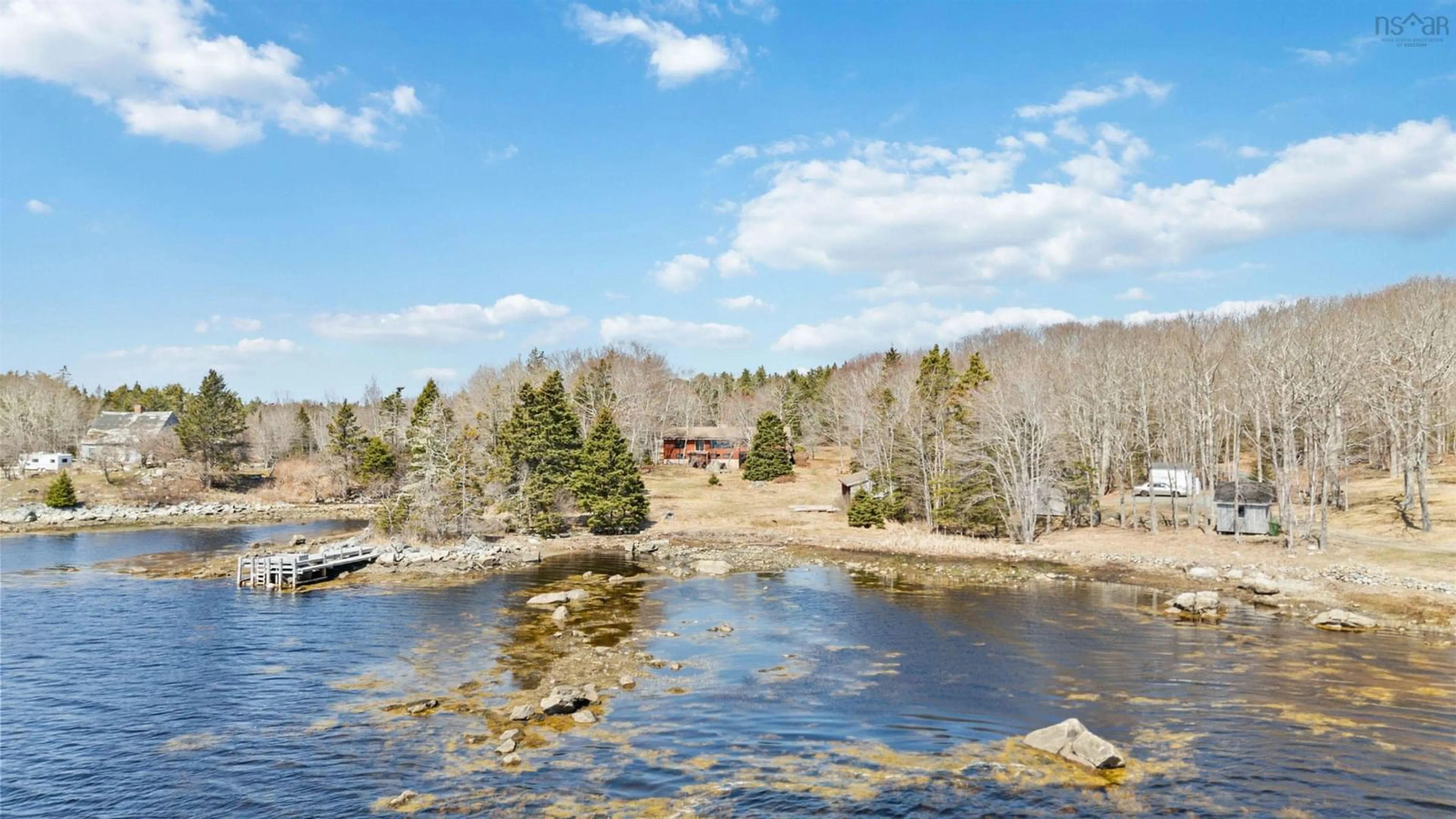 A pic from outside/outdoor area/front of a property/back of a property/a pic from drone, water/lake/river/ocean view for 9169 Highway 331, Voglers Cove Nova Scotia B0J 2H0