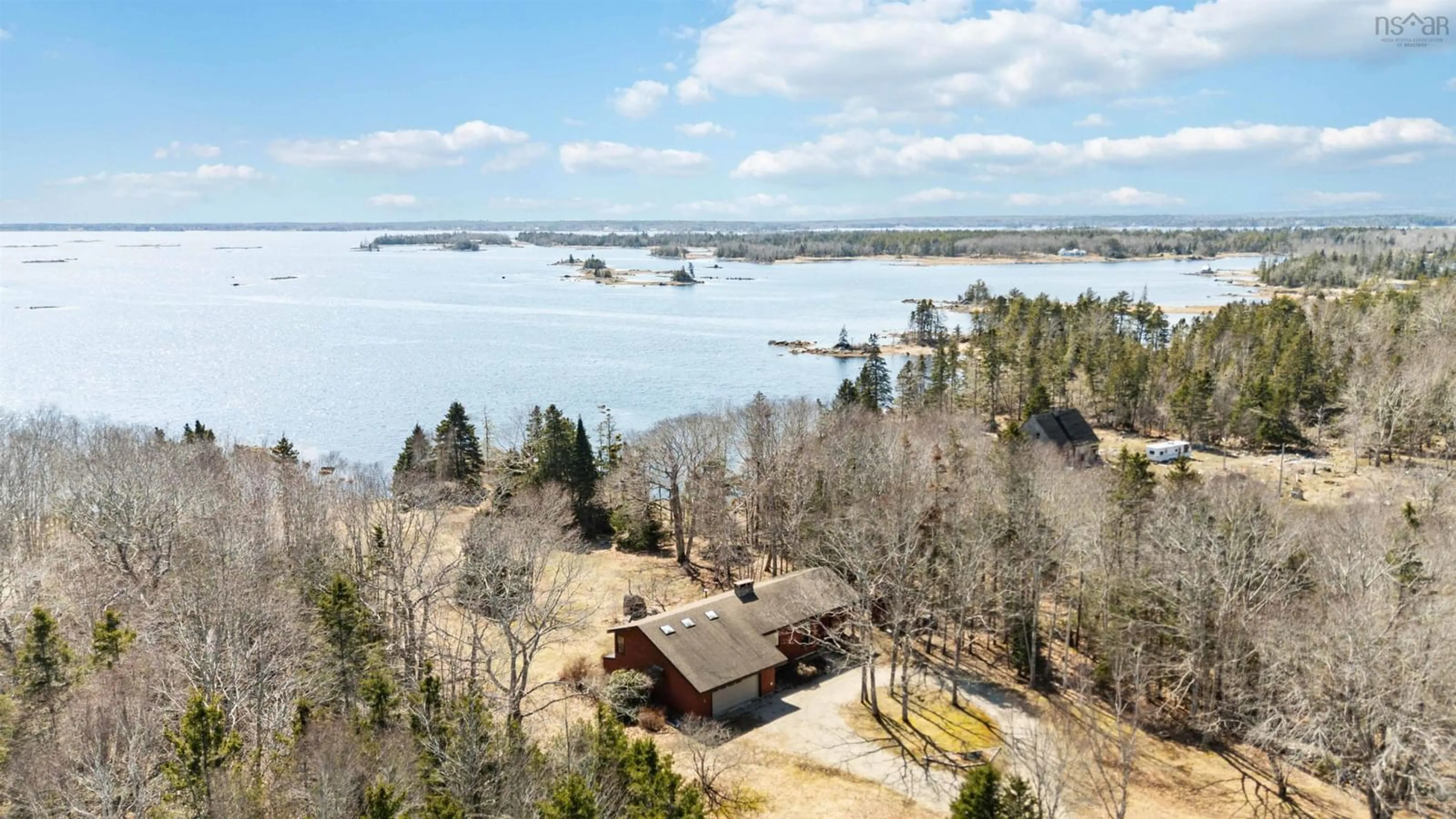 A pic from outside/outdoor area/front of a property/back of a property/a pic from drone, water/lake/river/ocean view for 9169 Highway 331, Voglers Cove Nova Scotia B0J 2H0